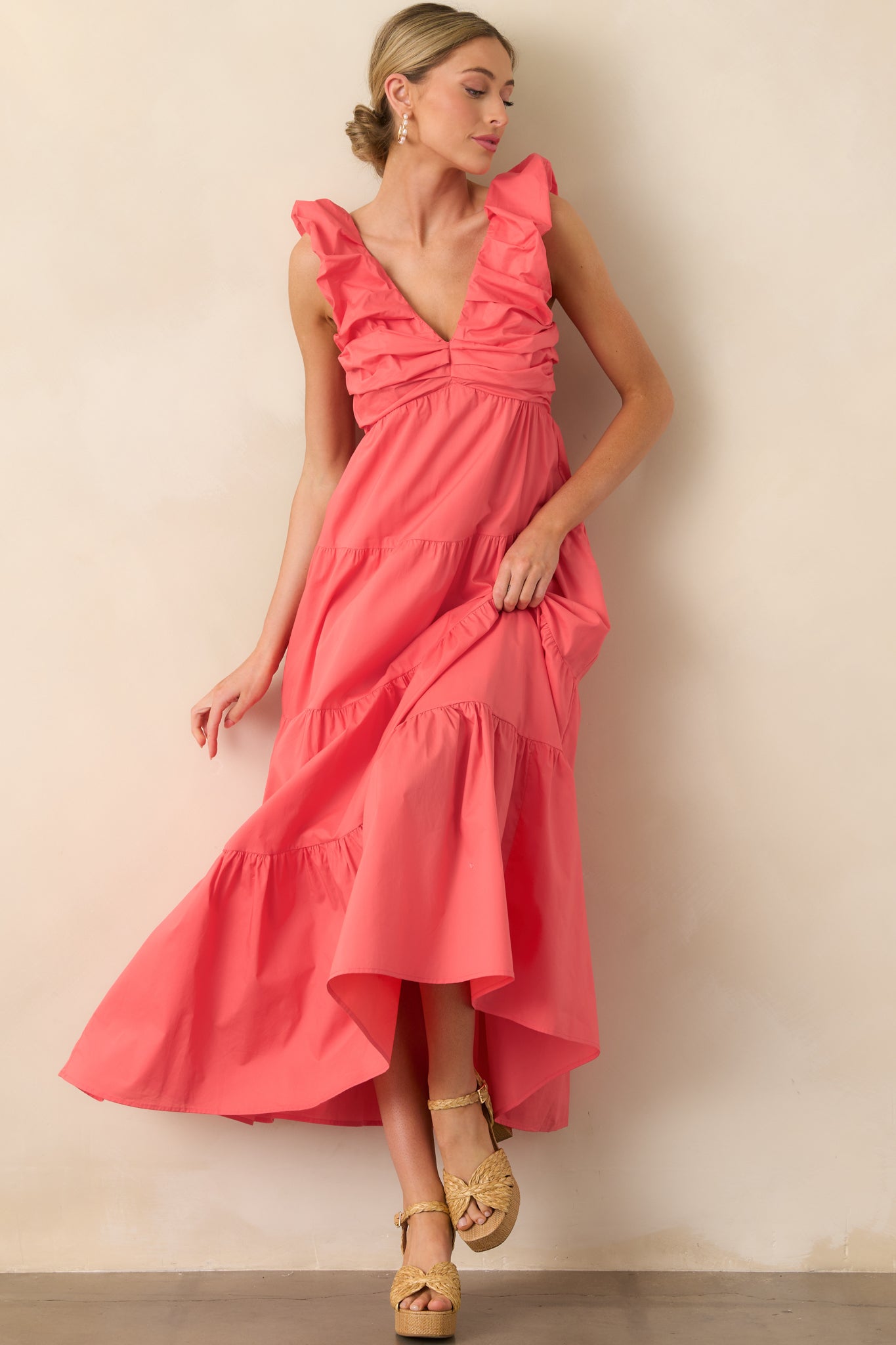 Full body angle highlighting the dress’s airy silhouette and structured smocked waistline.