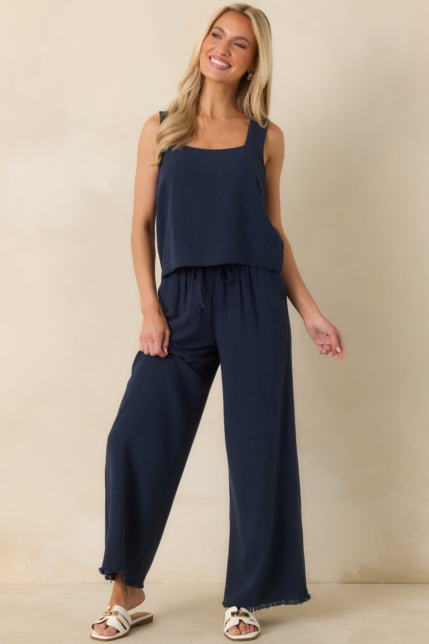 Front full view highlighting the easy pull-on fit and flowing wide-leg shape with soft movement through the fabric.
