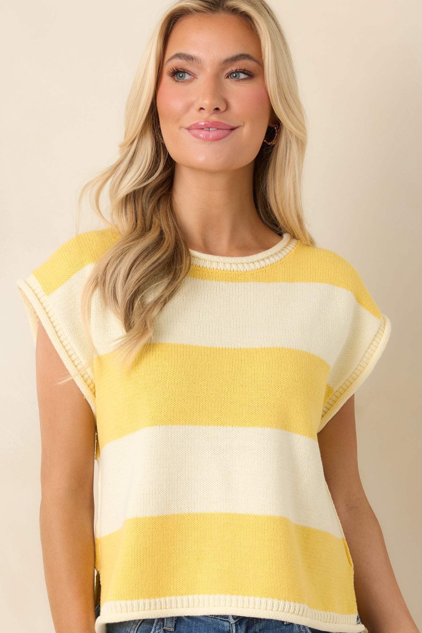 Cap-style sleeves with clean striped pattern finish.