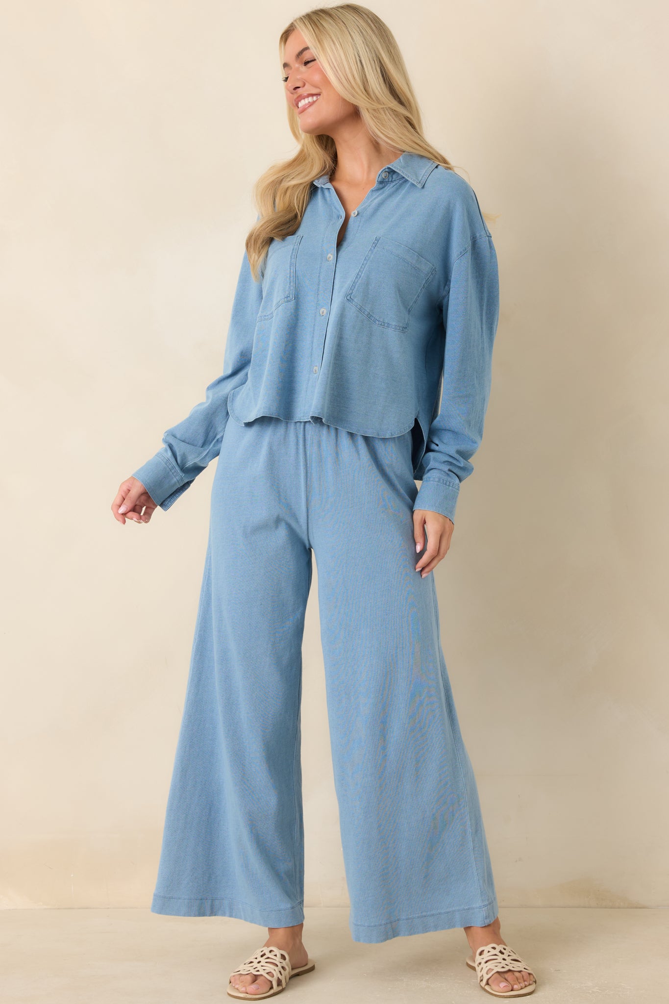 Wide leg black pants designed with a high-rise fit and effortless everyday comfort.