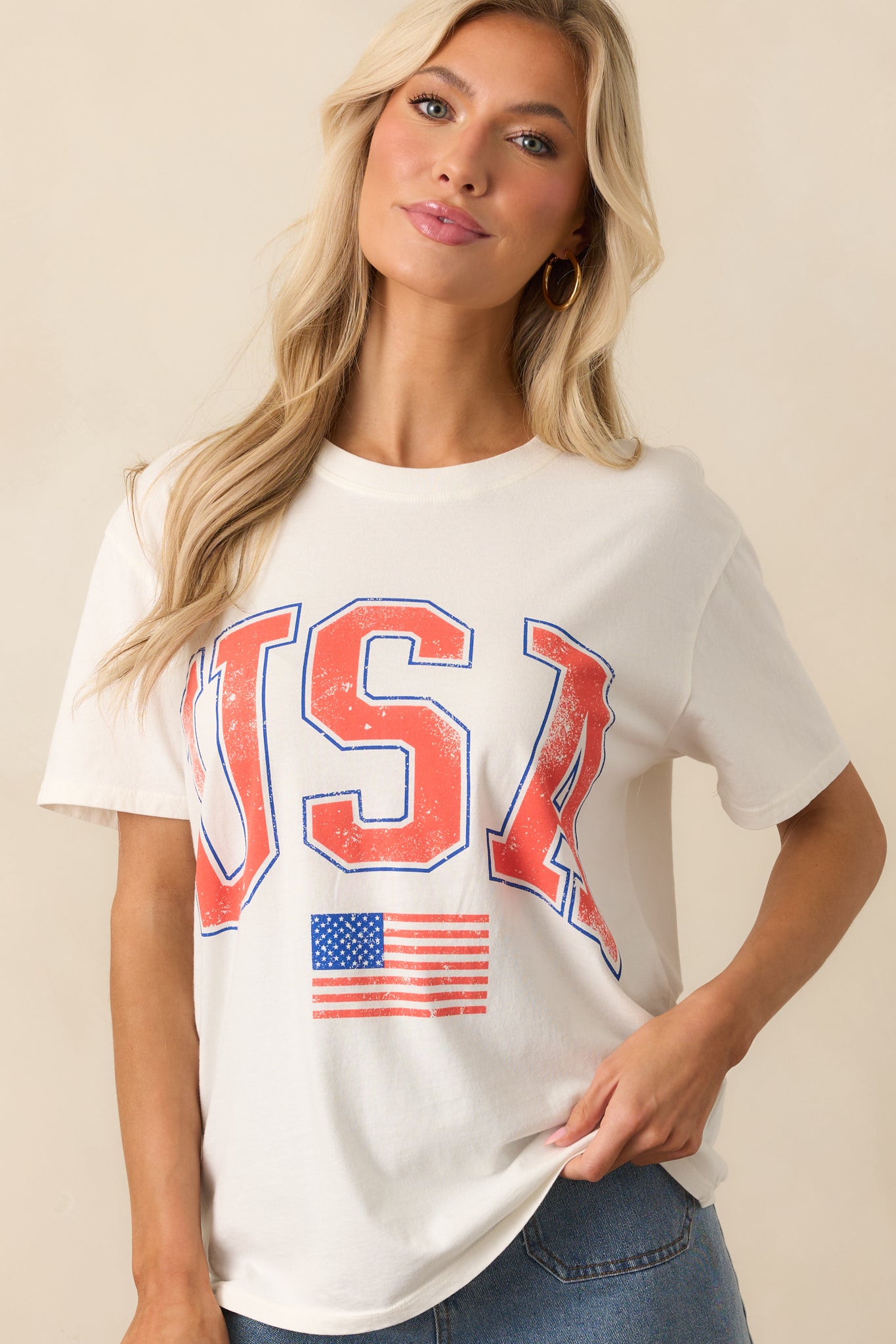 View crop of the tee, emphasizing the short sleeve and lightweight cotton fabric.