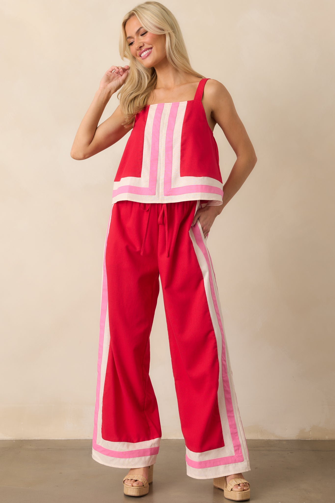 Straight-on full body shot emphasizing the placement of the contrast center seam and clean edges of the neckline.