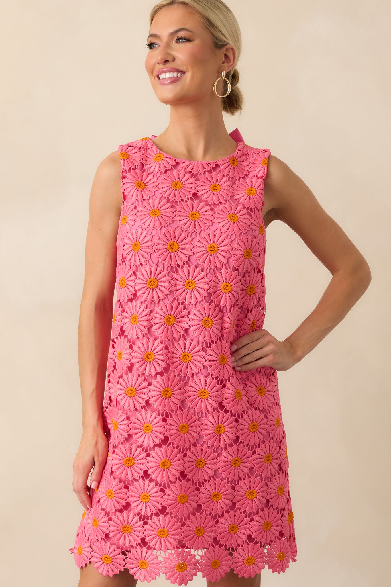 Cropped shot highlighting the round neckline and delicate lace pattern.