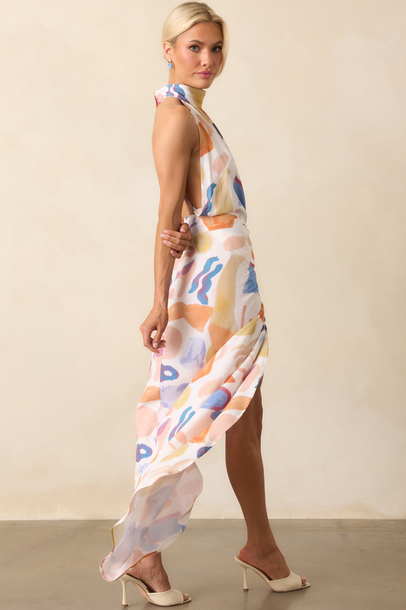 Full length shot emphasizing the vibrant multicolor pattern and how the adjustable waist tie defines the silhouette.