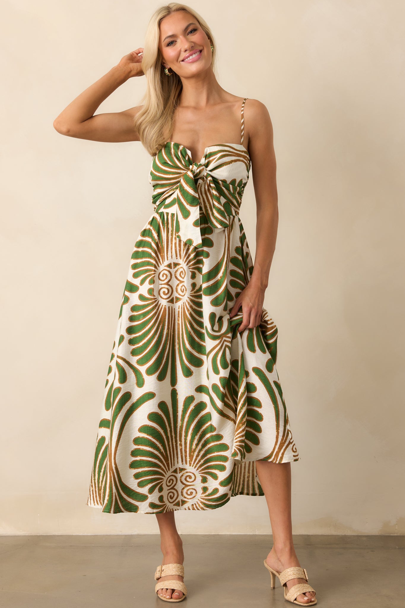 Full body centered view focusing on the structured bodice and how the print curves with the shape of the dress.
