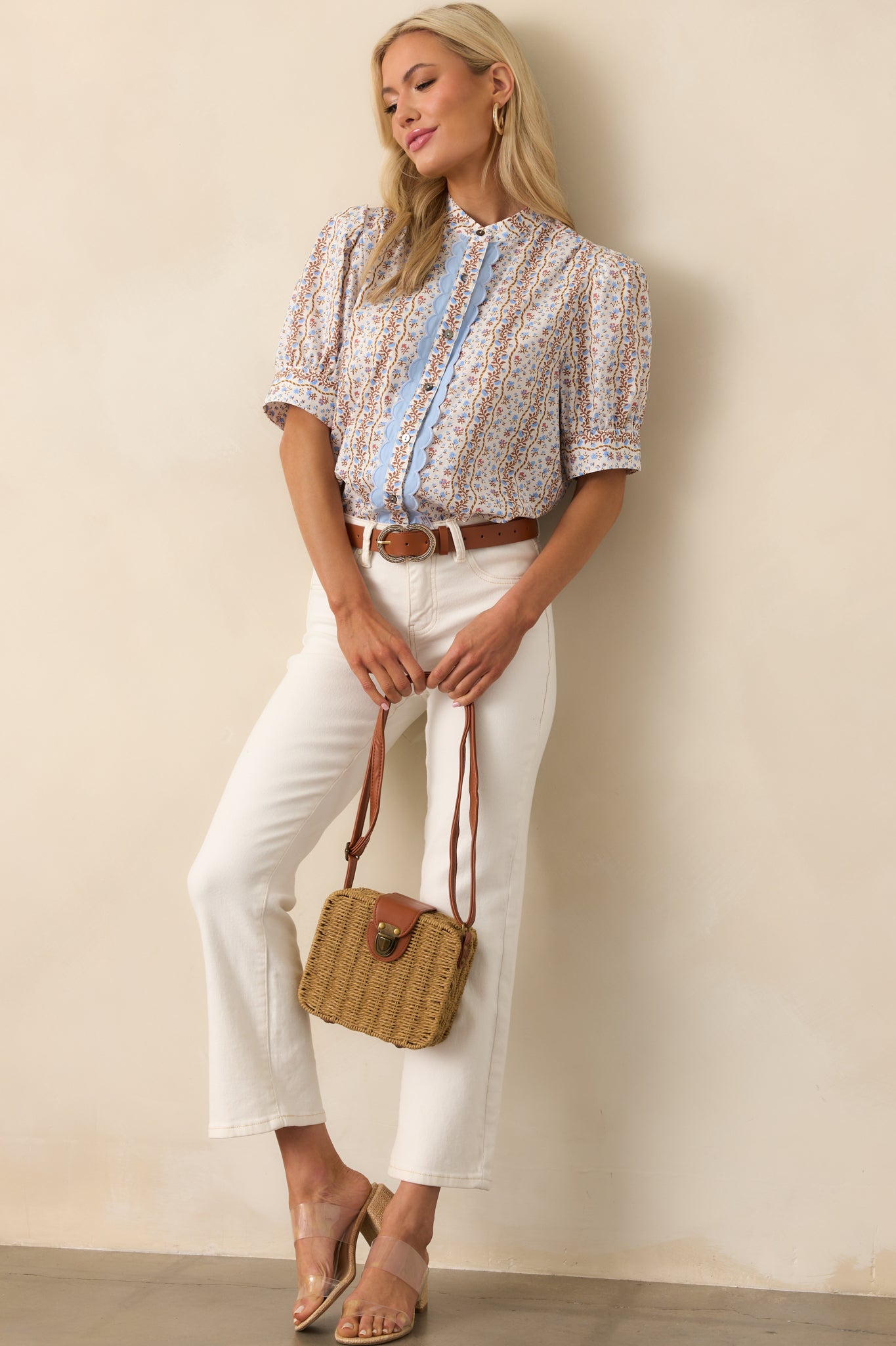 These jeans feature a tan stitching, a front button and functional zipper, and two functional back pockets.