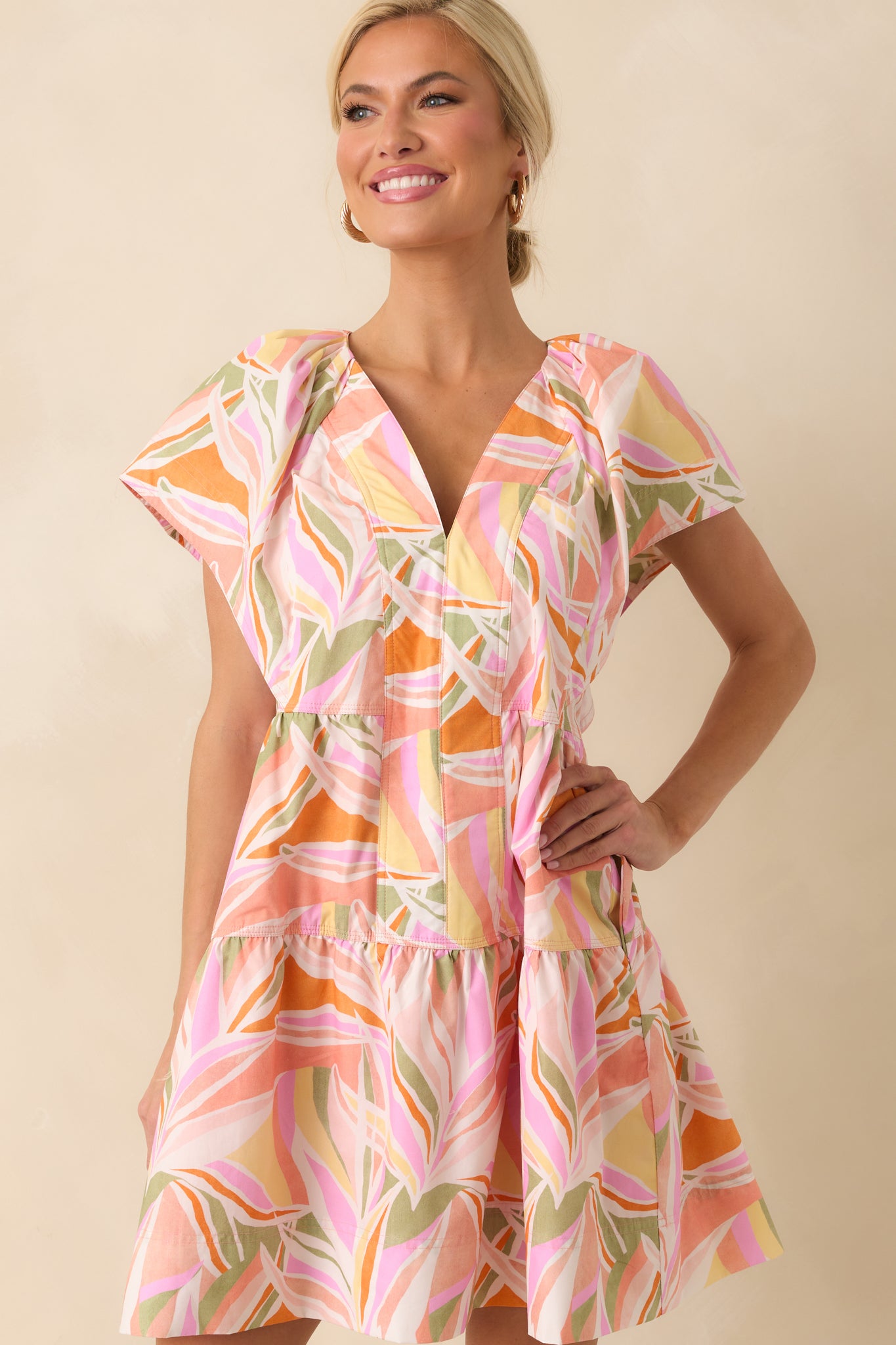 Zoomed-in view of the waist area, highlighting the panel construction, white topstitching, and pocket opening.