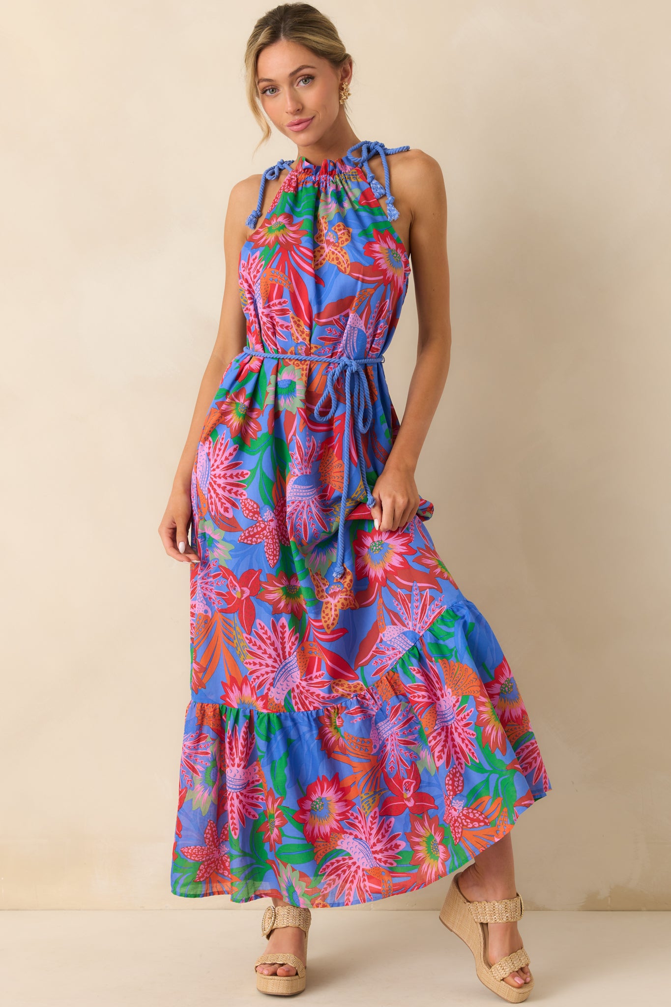 Front view emphasizing the ruffle trim detailing along the neckline and the flowy silhouette of the maxi skirt.