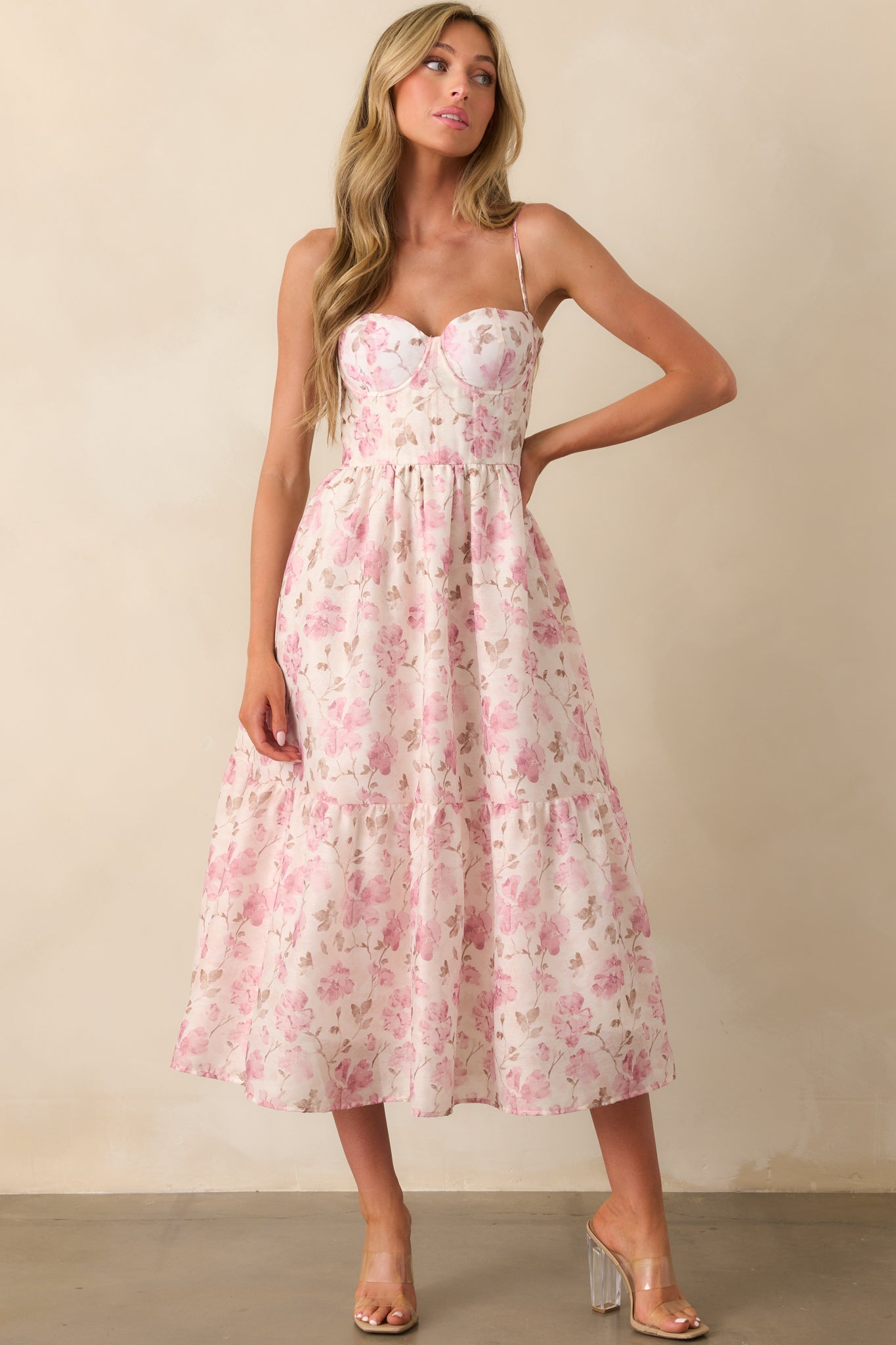 Dusty pink dress with a flowy chiffon overlay and fitted bodice highlighted in a front-facing pose.