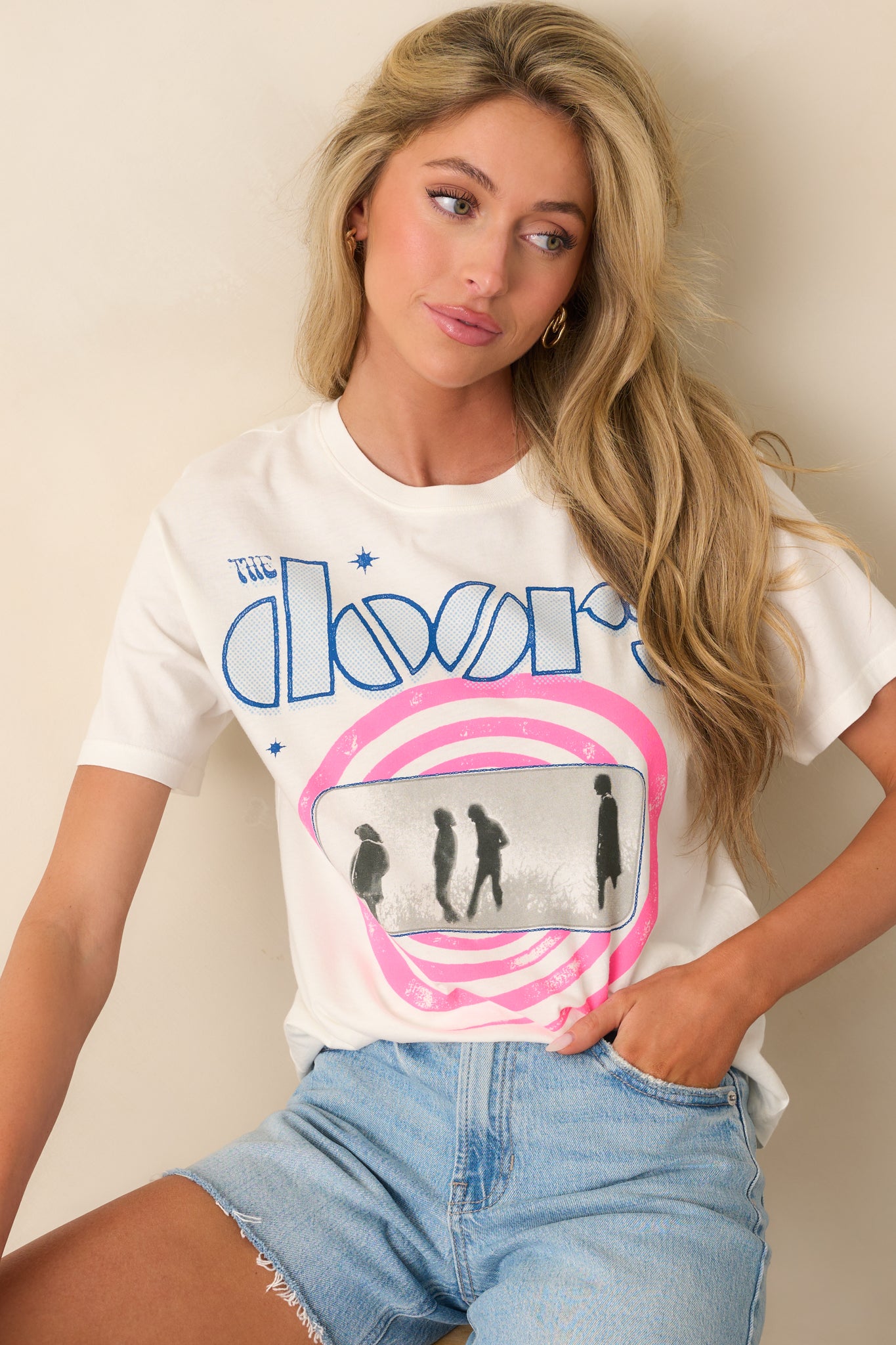 Focused shot of the short sleeve and relaxed fabric texture on the white tee.