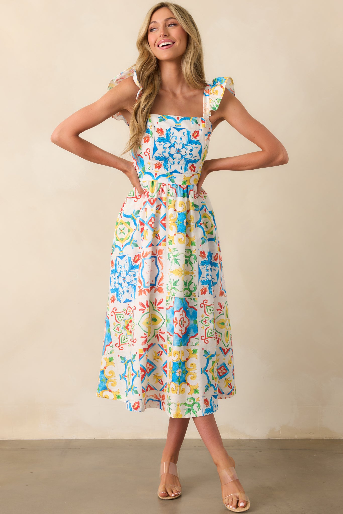 A front-facing full view of the dress, highlighting the smooth, flowy fit and the continuous Sicilian tile design from top to bottom.