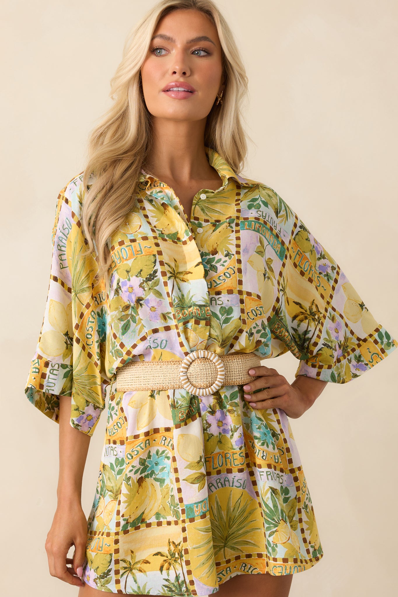 Complete outfit photo highlighting the short sleeves, functional button front, and included tan woven belt.