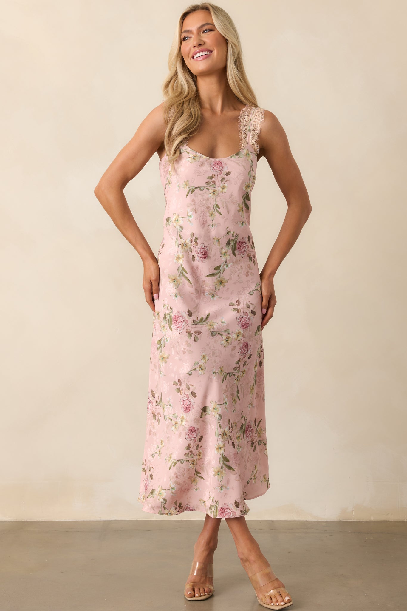 Full-length shot of the pink jacquard dress, focusing on the soft drape and subtle sheen of the fabric.