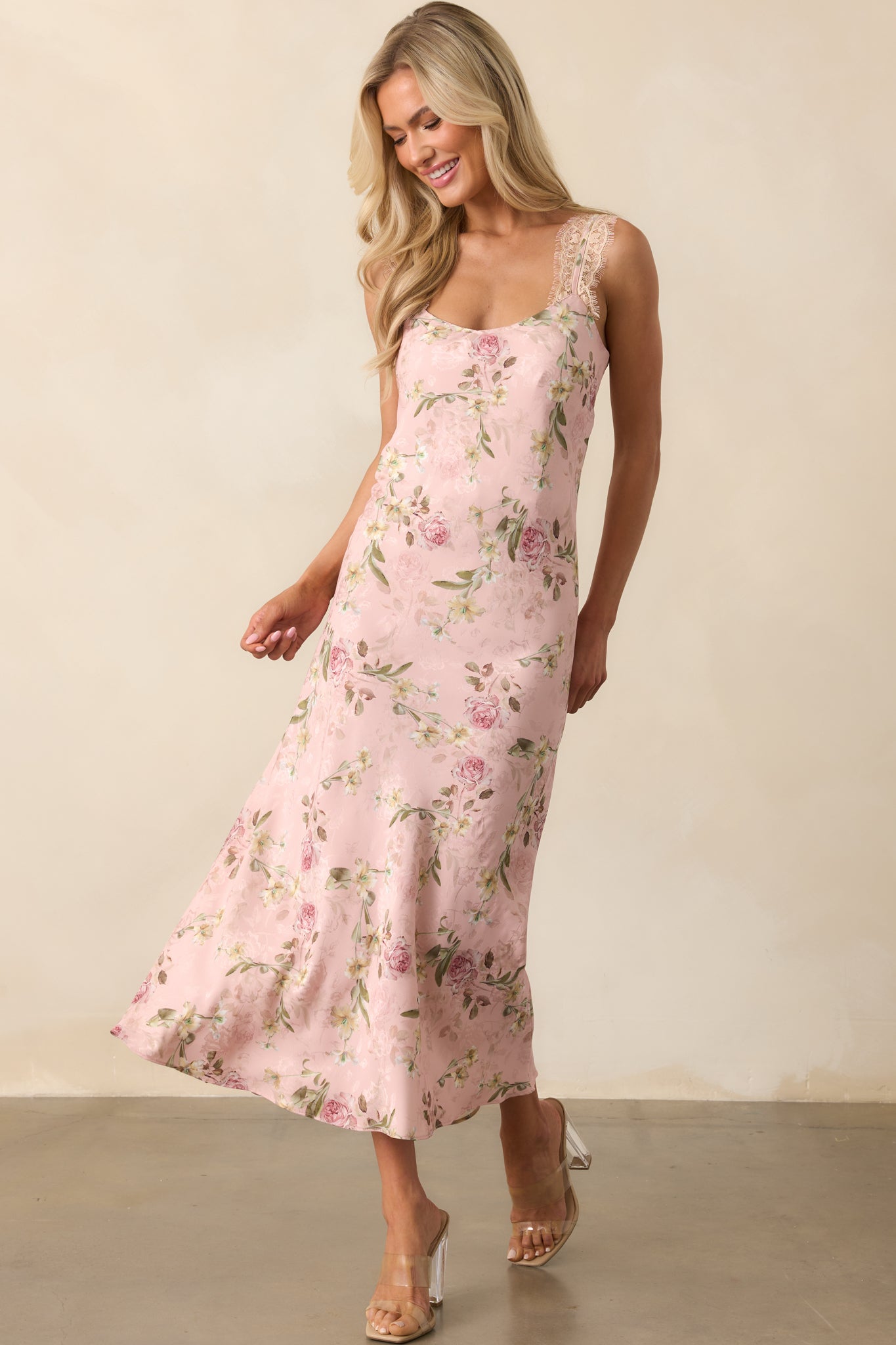 Rose pink slip dress with floral jacquard fabric and scoop neckline, shown in a full front view to highlight the flowing silhouette.