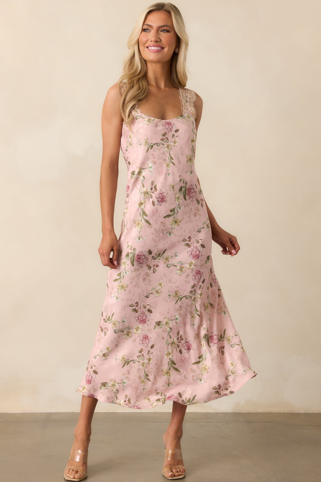 Rose pink dress displayed from the front, highlighting the delicate lace details along the neckline and shoulders.