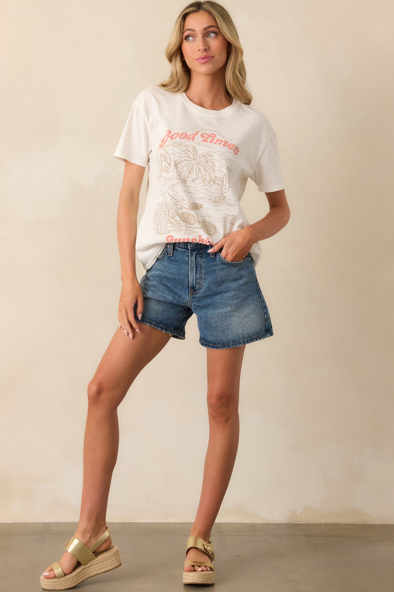 A full-length view of the high-rise shorts showing the classic button zipper closure and fitted waistband.