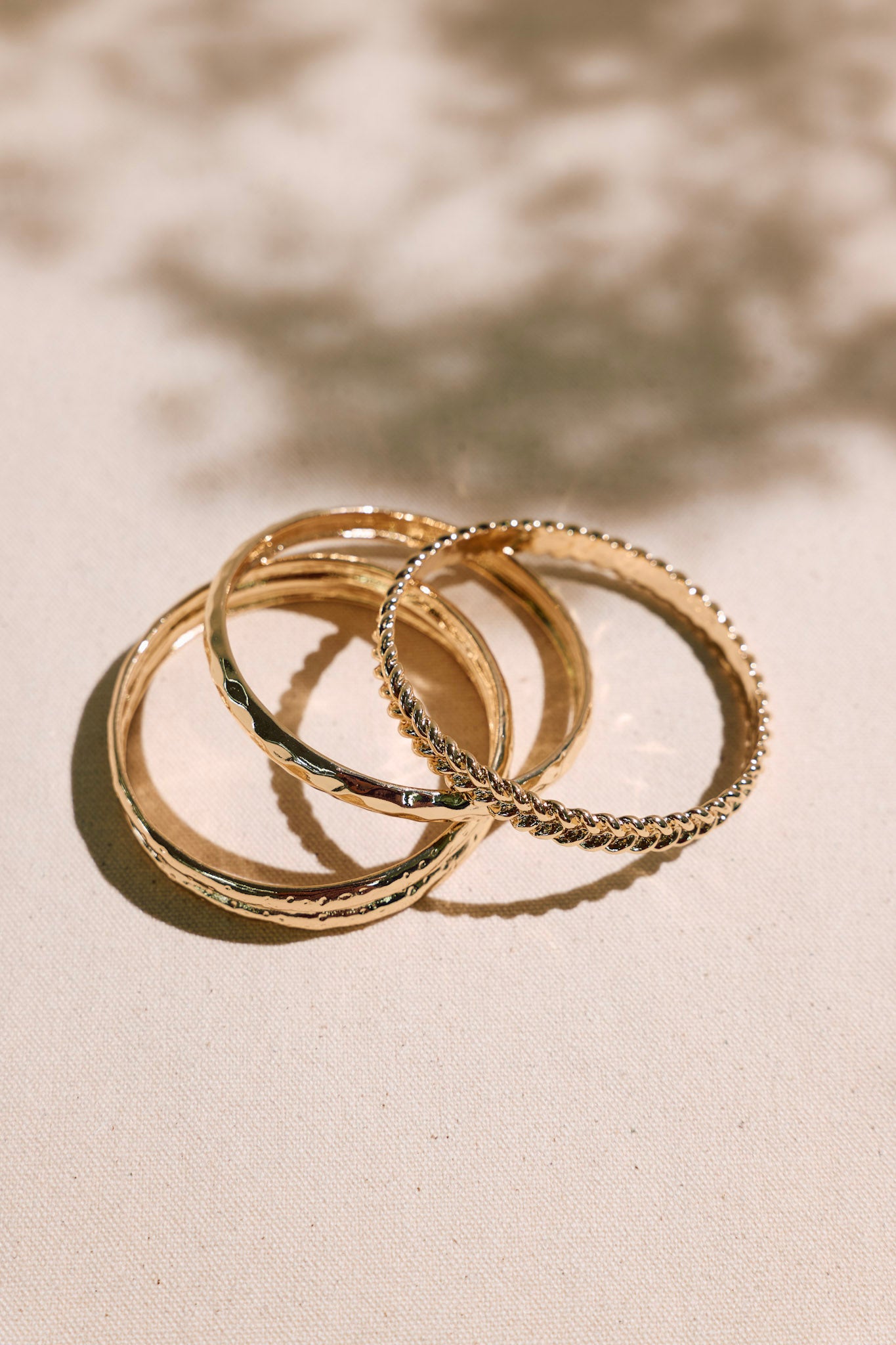 Twisted Elegance Textured Gold Bangle Stack