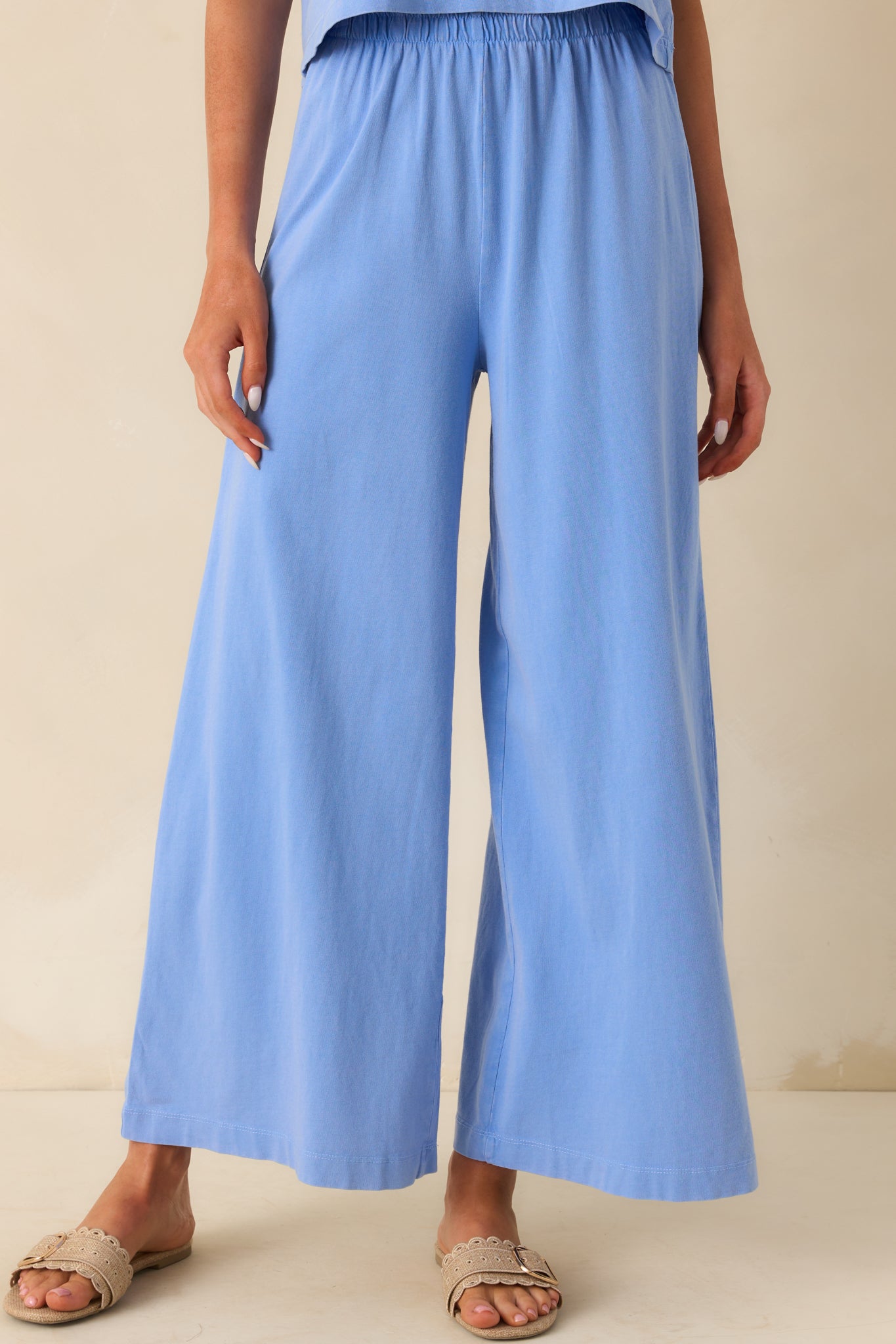 Front view of the light blue pants showcasing the high rise fit, wide leg silhouette, and relaxed shape.
