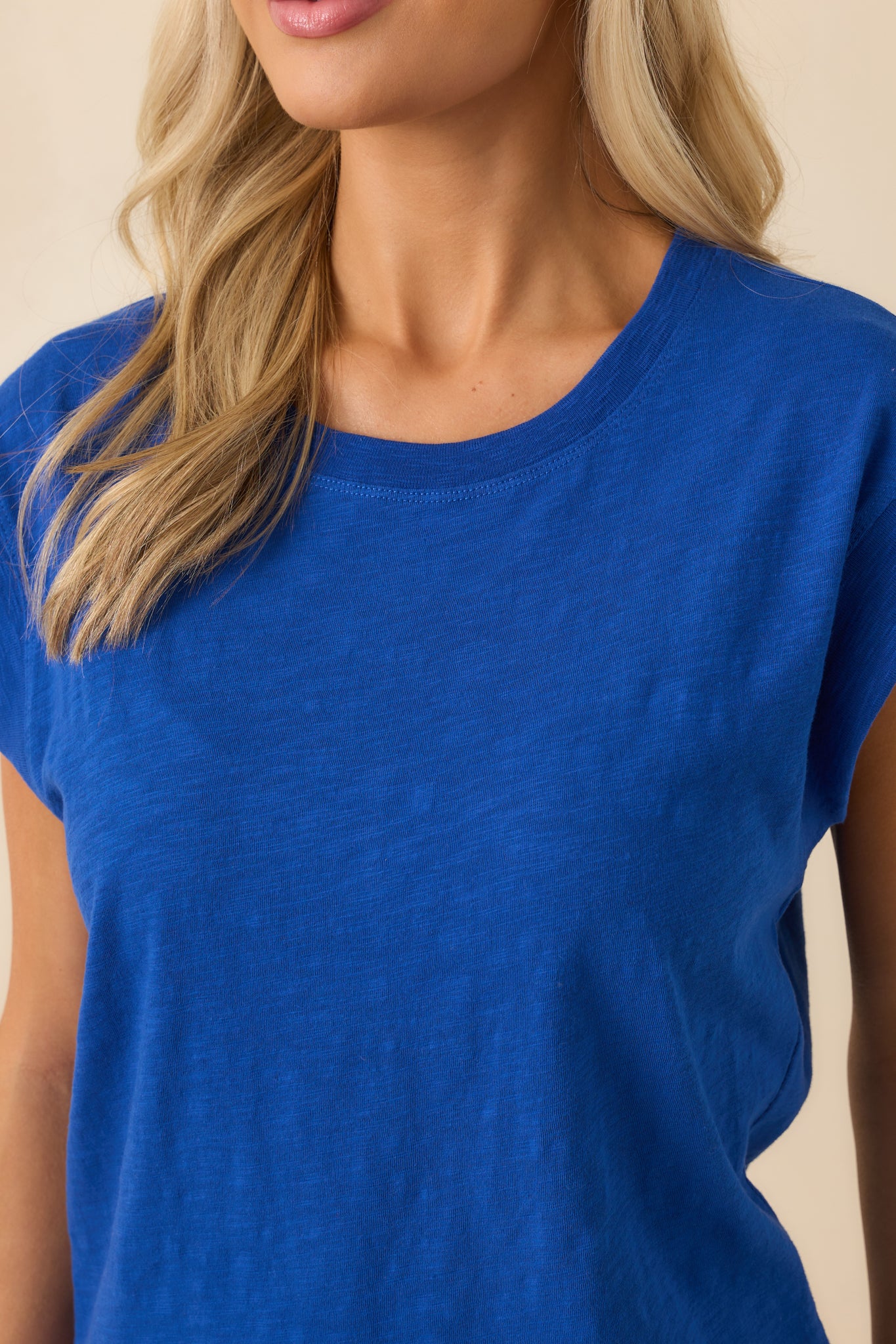 Close-up detail of the cotton slub fabric, showing its lightweight weave and texture.