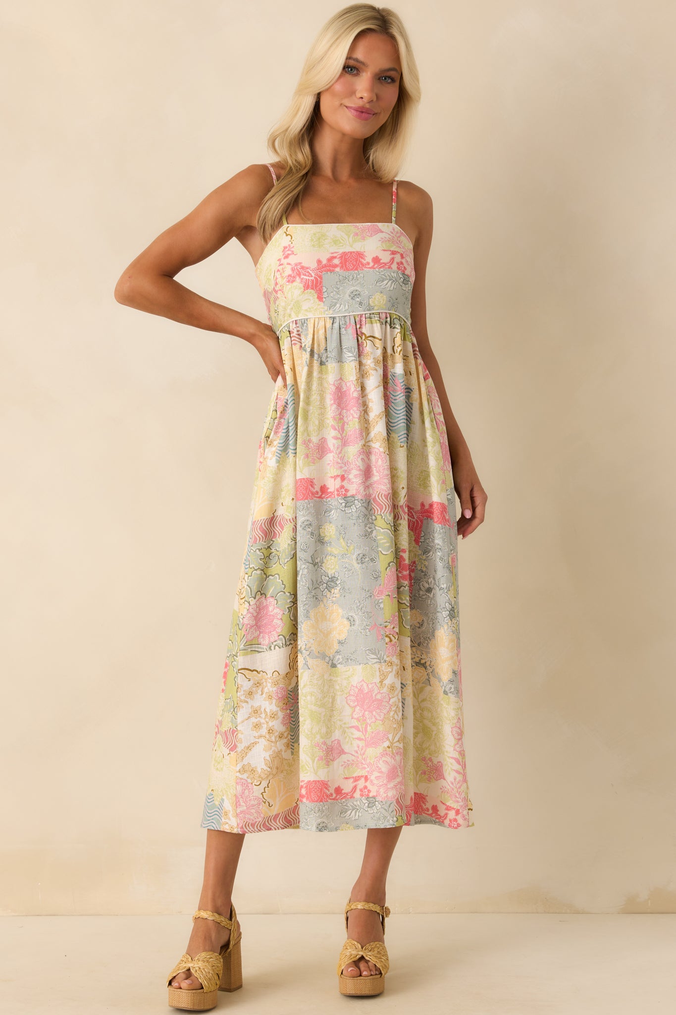 Wide front shot of the midi dress emphasizing the length, flowy movement of the skirt, and visible pocket placement.