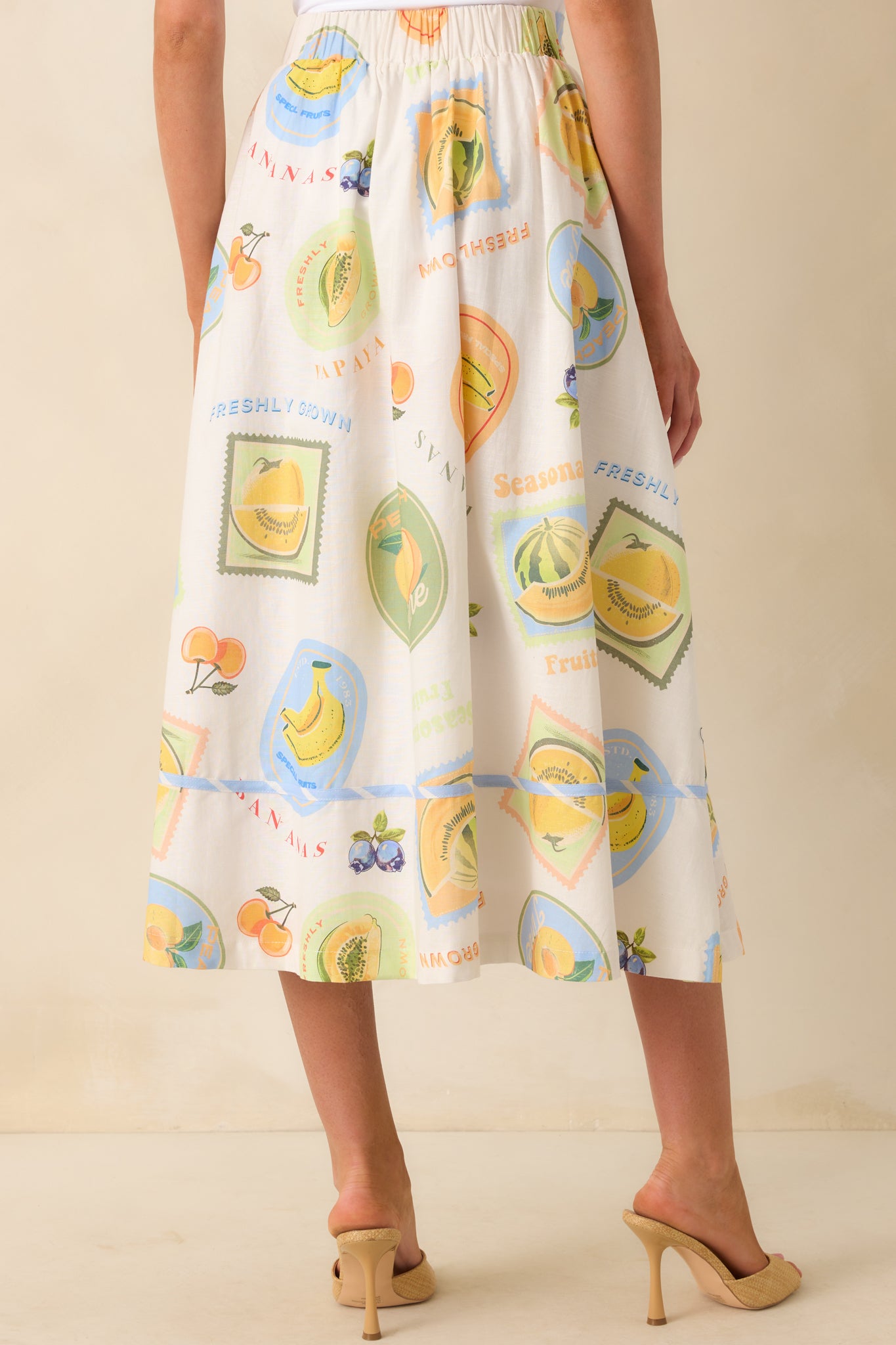 A view from behind featuring the elastic waist insert and continued patchwork print across the full back of the skirt.