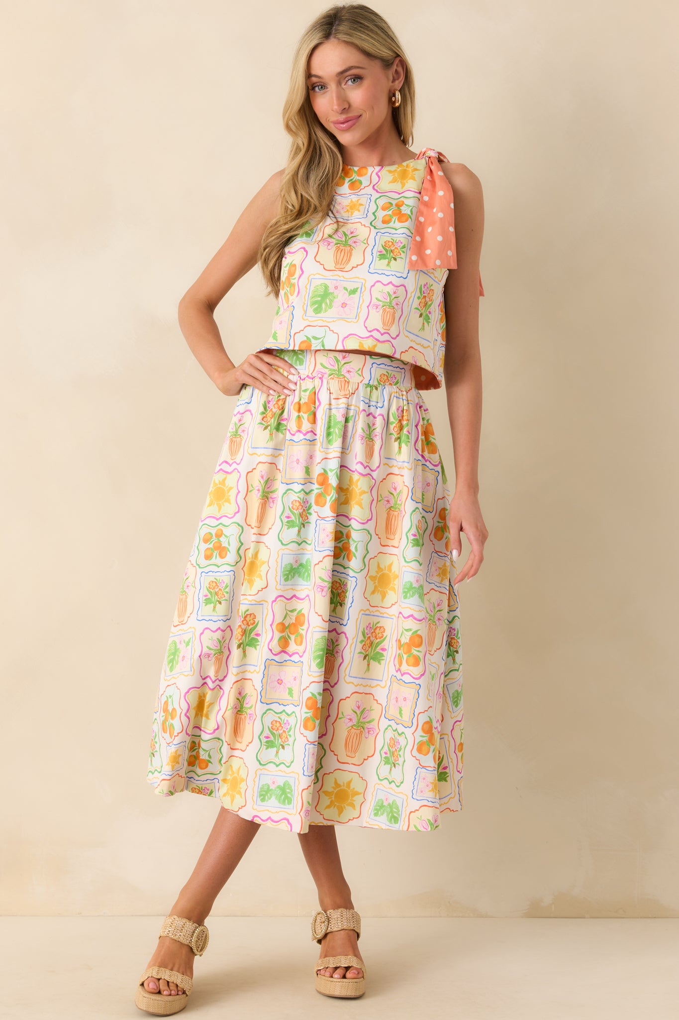 Full-length view of patchwork print skirt highlighting pockets and tiered seam details.