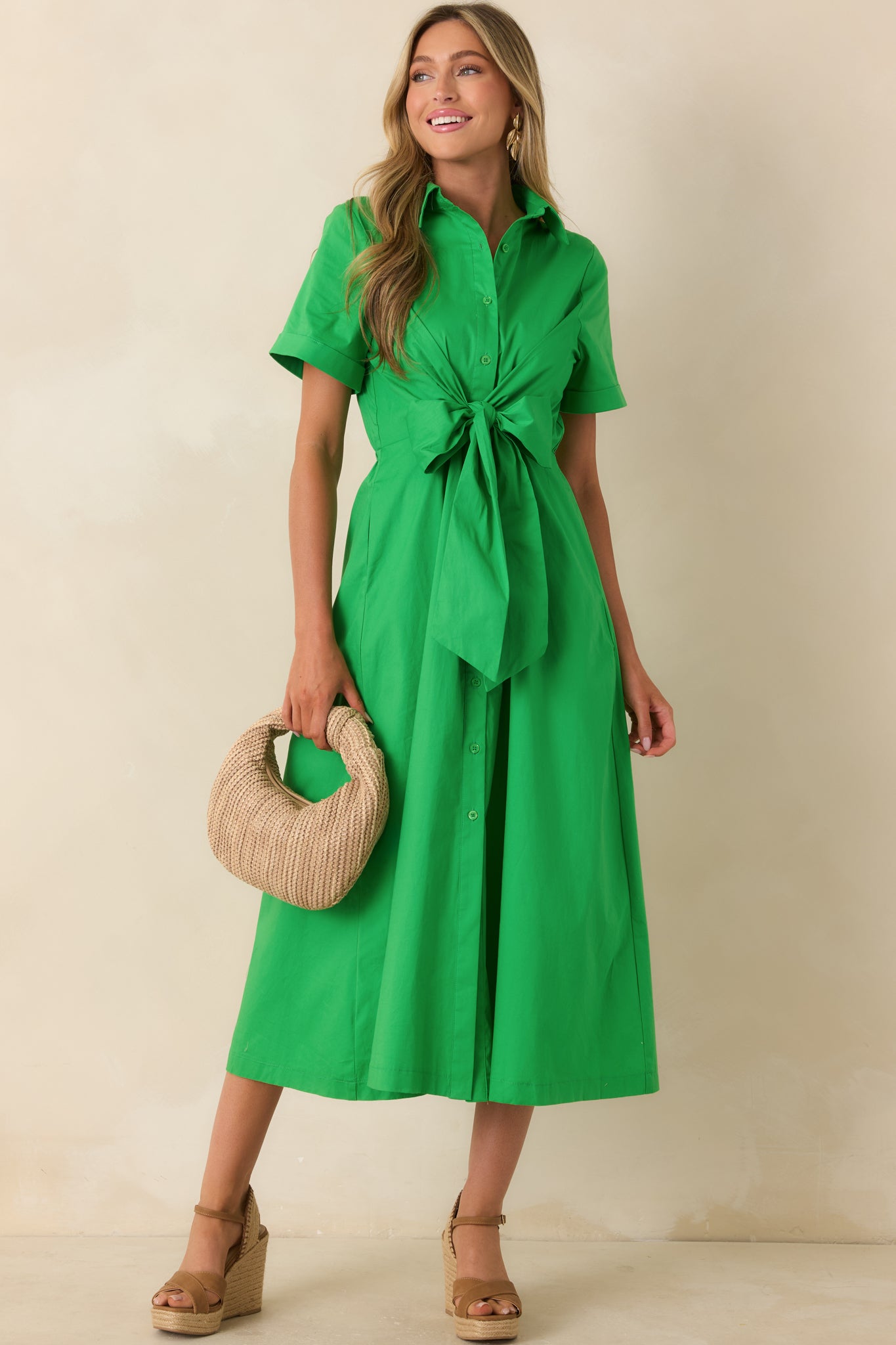 Midi shirt dress with a statement front bow detail and full flowing skirt in a lightweight cotton blend.