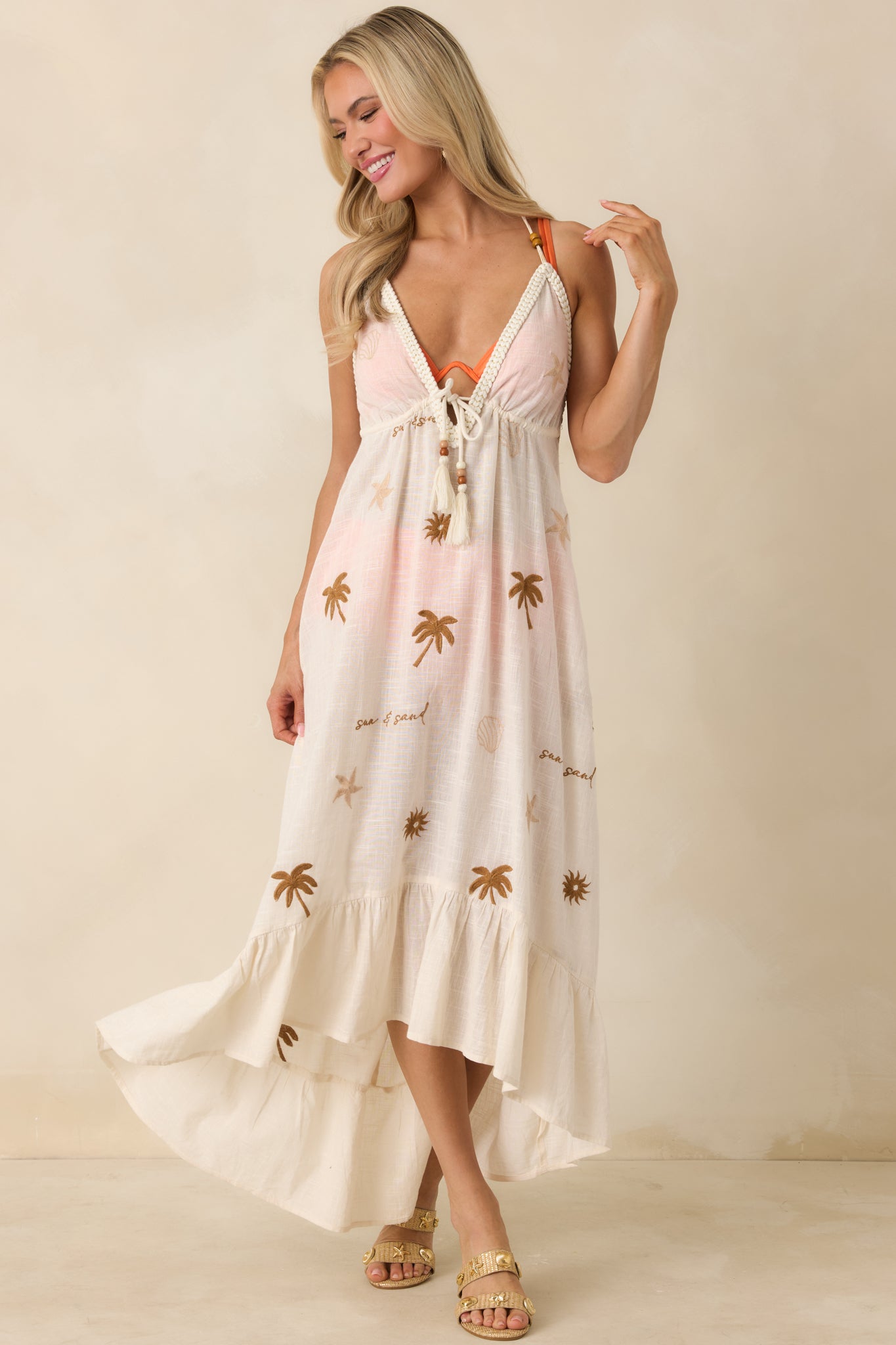 Light beige gauze cotton midi dress with flowy silhouette and deep V-neckline.