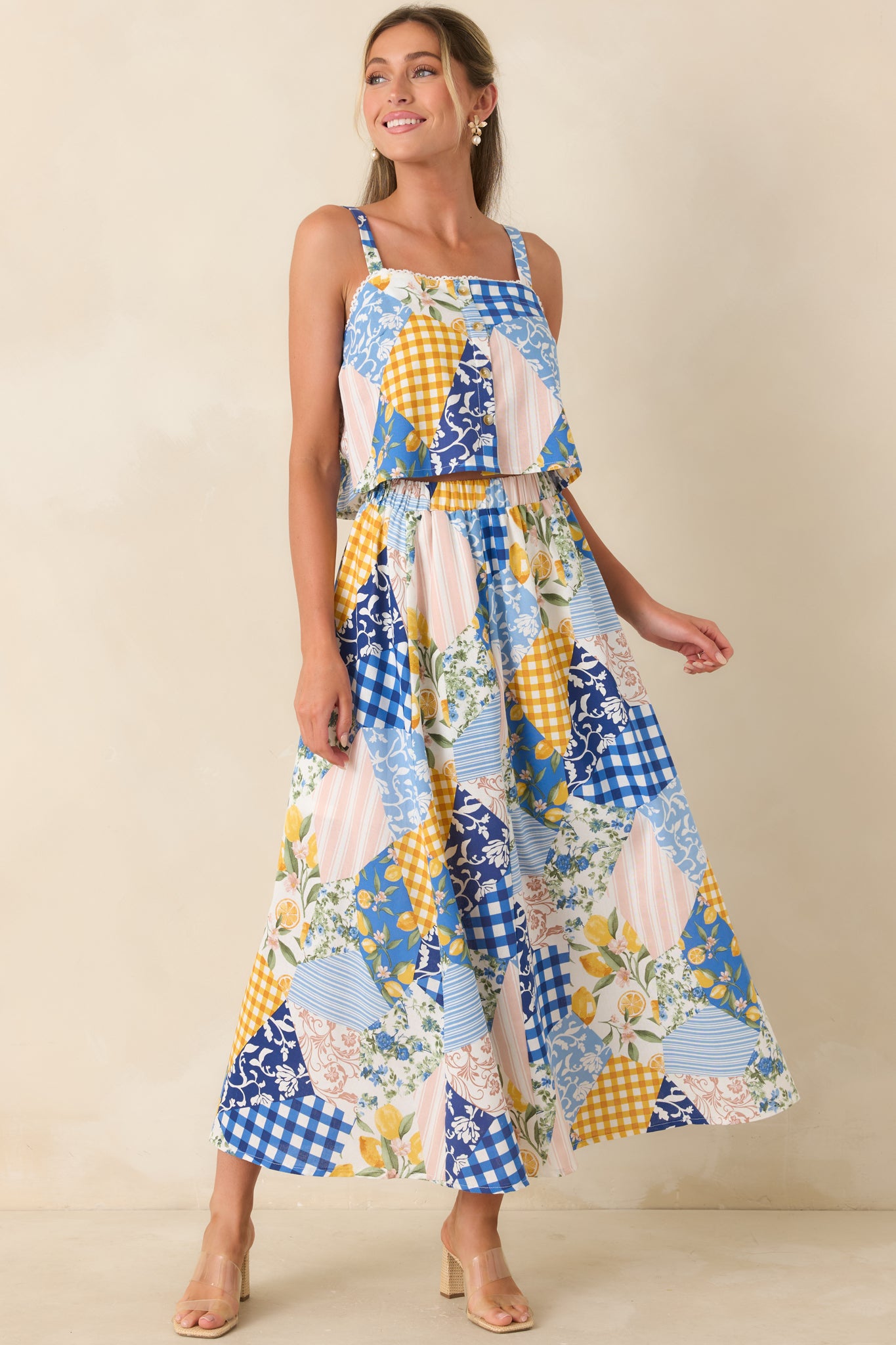 Flowing midi skirt with mixed prints, elastic waist, and a breezy, relaxed shape.