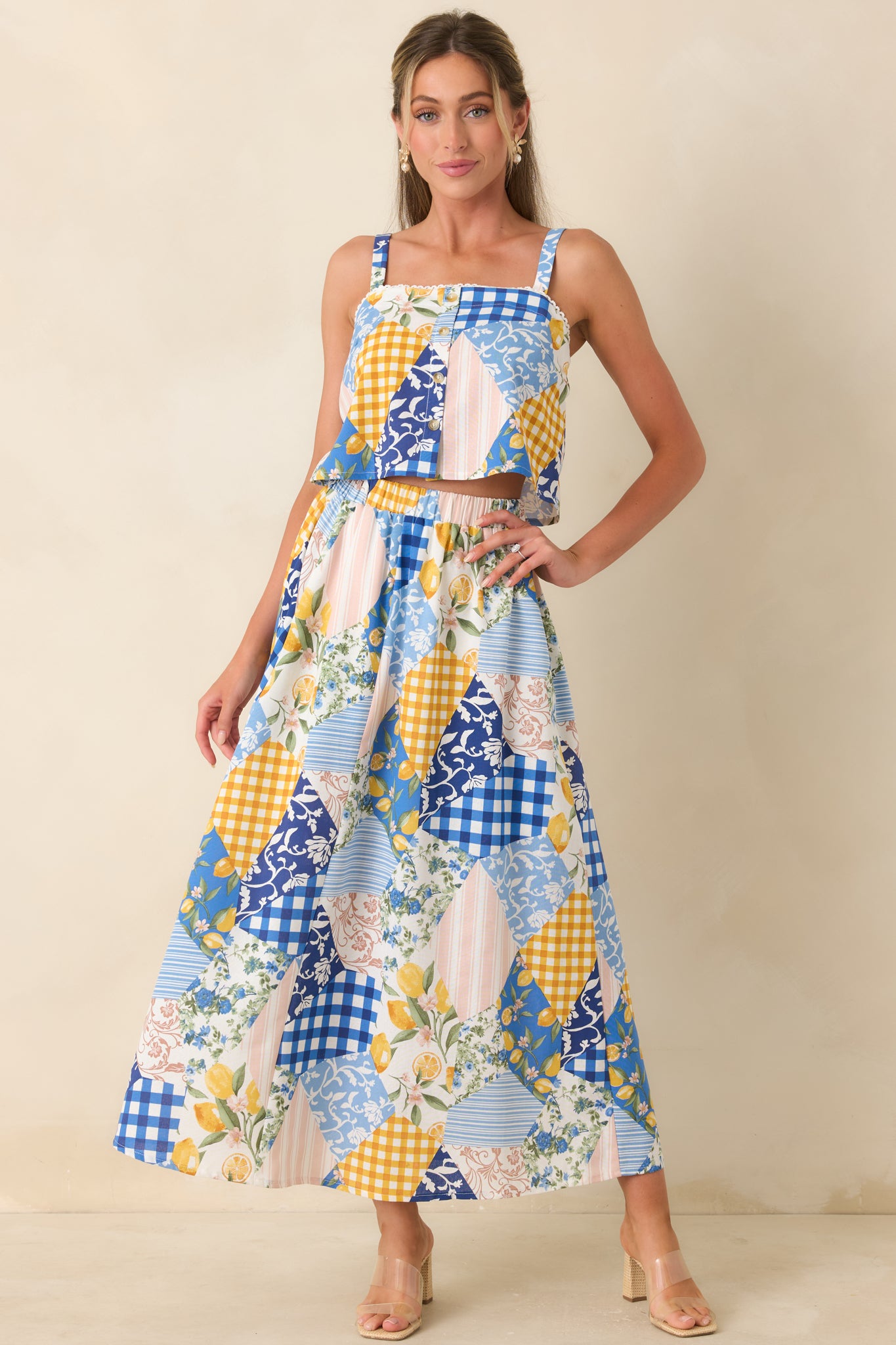 Blue multi print cropped top with square neckline and delicate trim detailing.