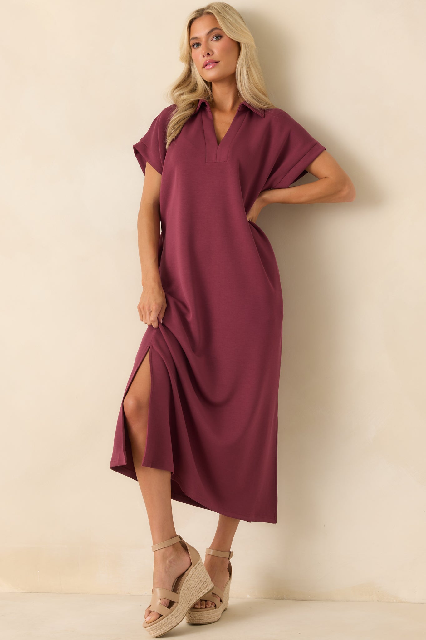 Front view of burgundy midi dress with collared notch v-neckline, short sleeves, and relaxed fit.