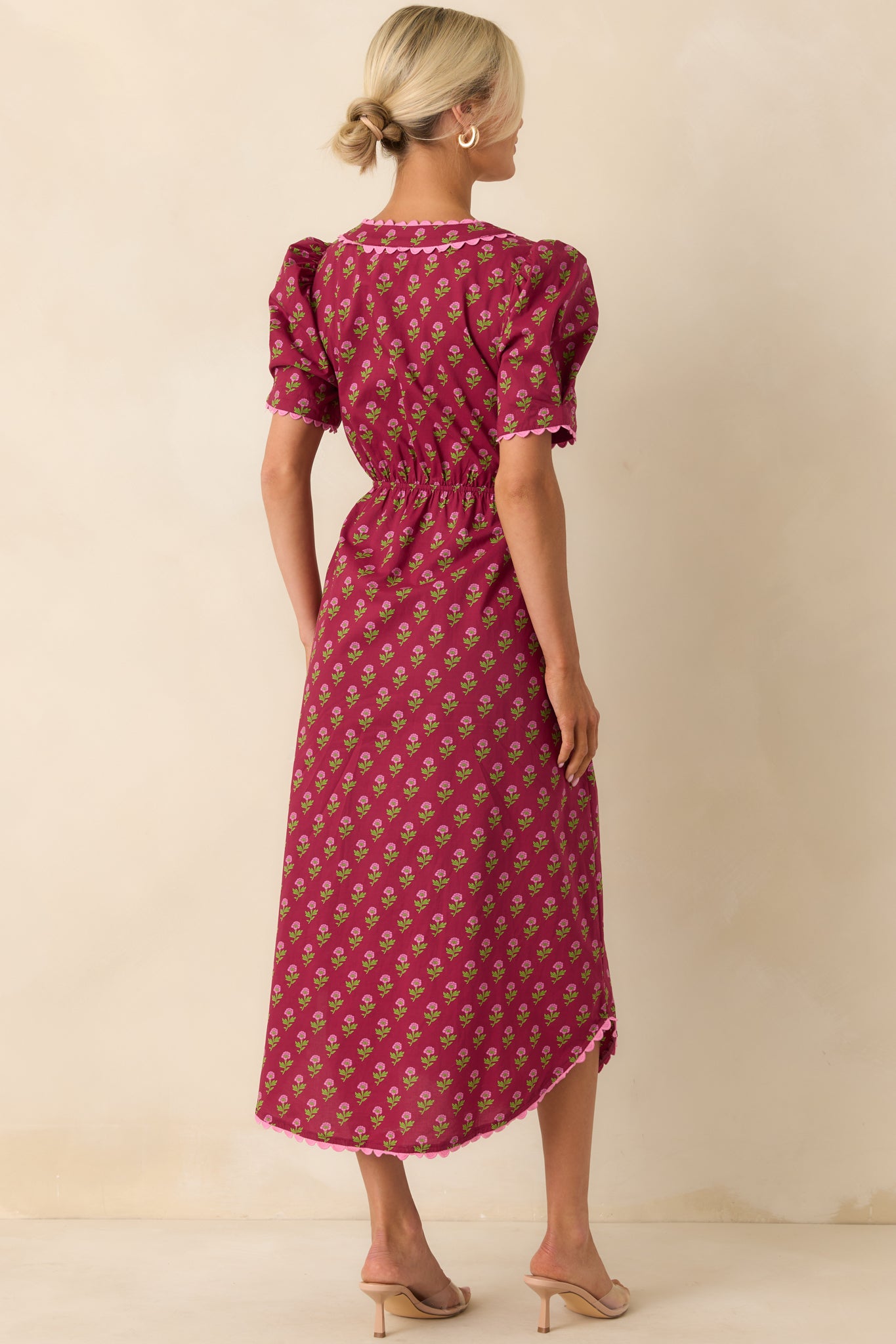 Back view showing the elastic waist insert and the continuation of the floral print across the back.