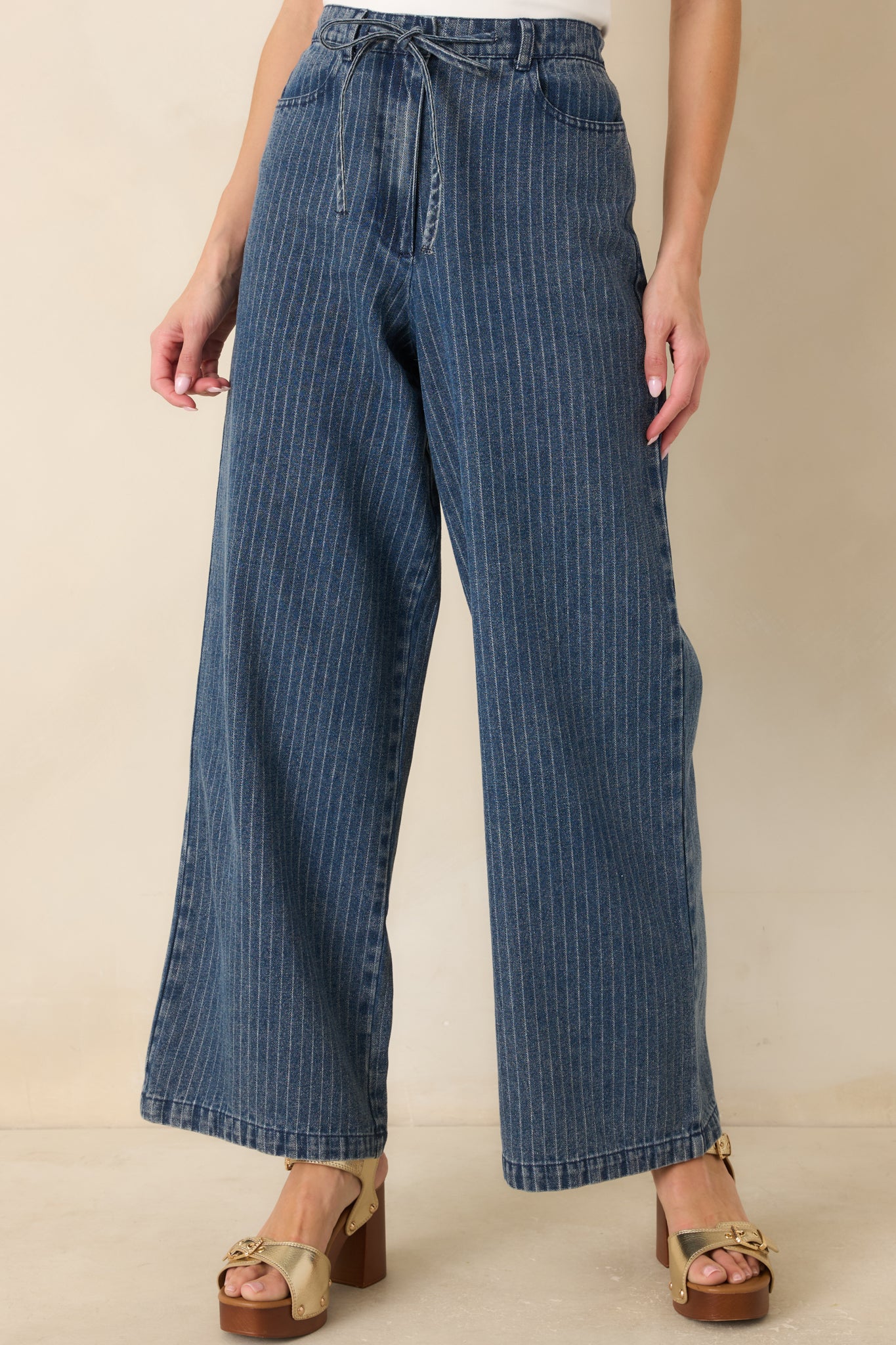 Front section highlighting the wide leg opening and soft, fluid drape of the cotton blend denim.