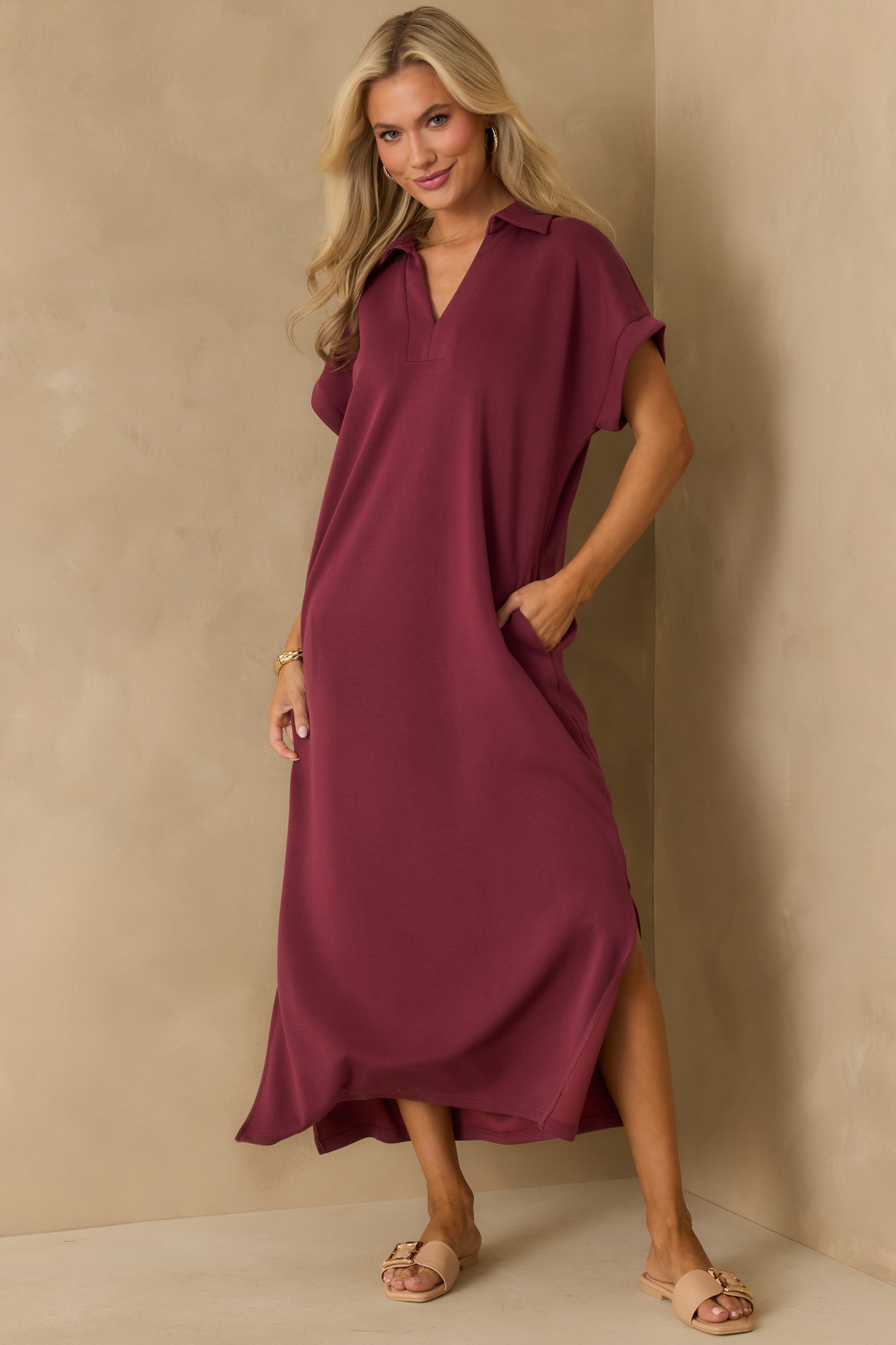 Midi dress featuring side vent leg slits and a casual, easy drape.