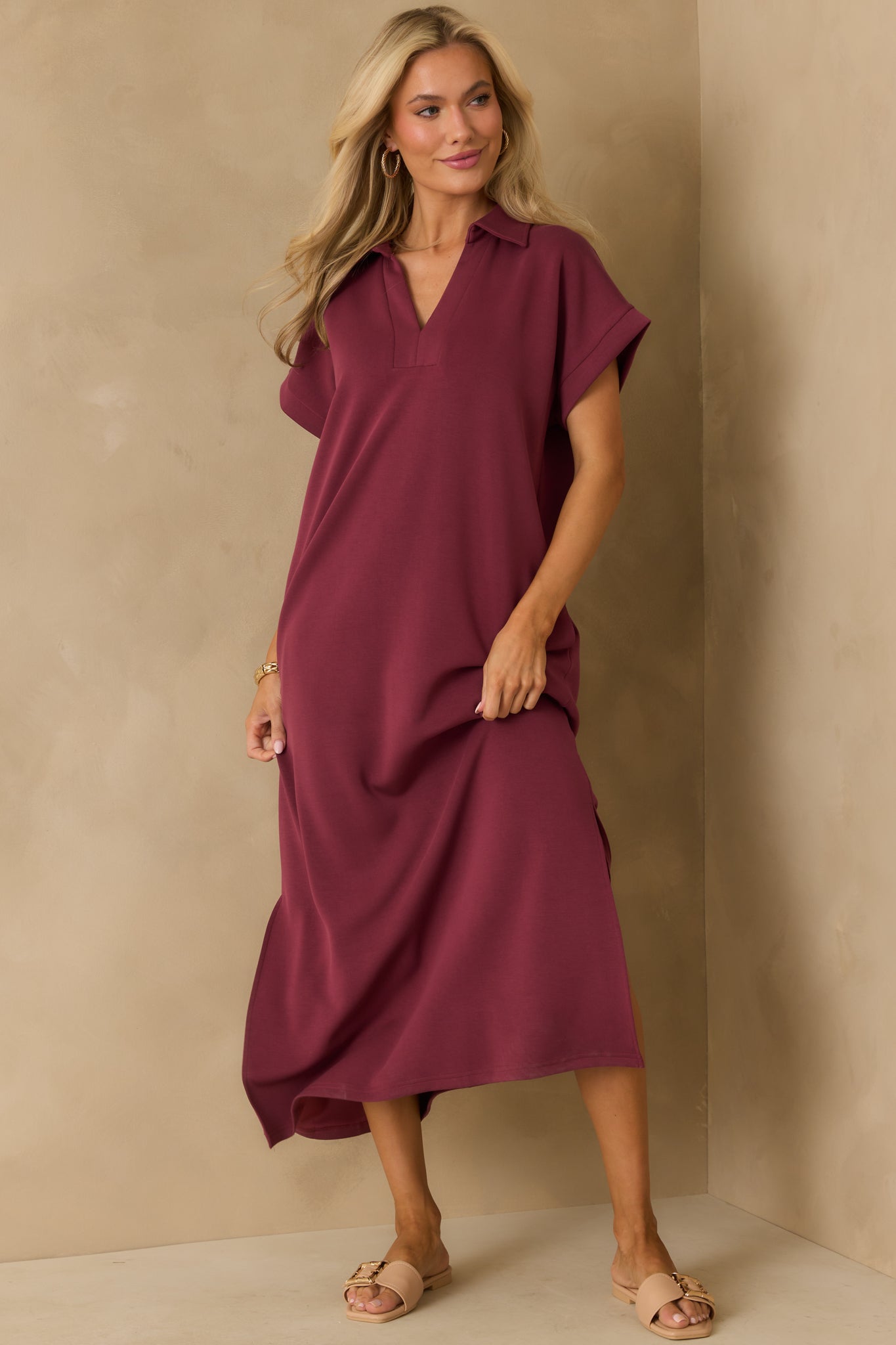 Burgundy collared midi dress with a notch neckline and clean silhouette.