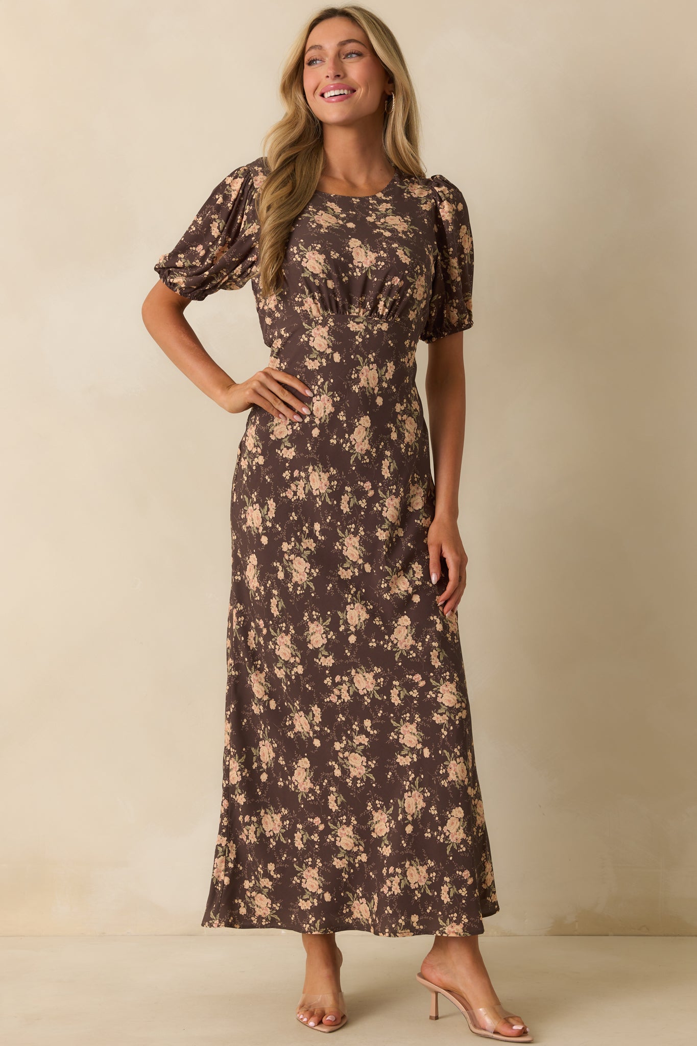 Floral brown dress highlighting the flattering empire waist silhouette.
