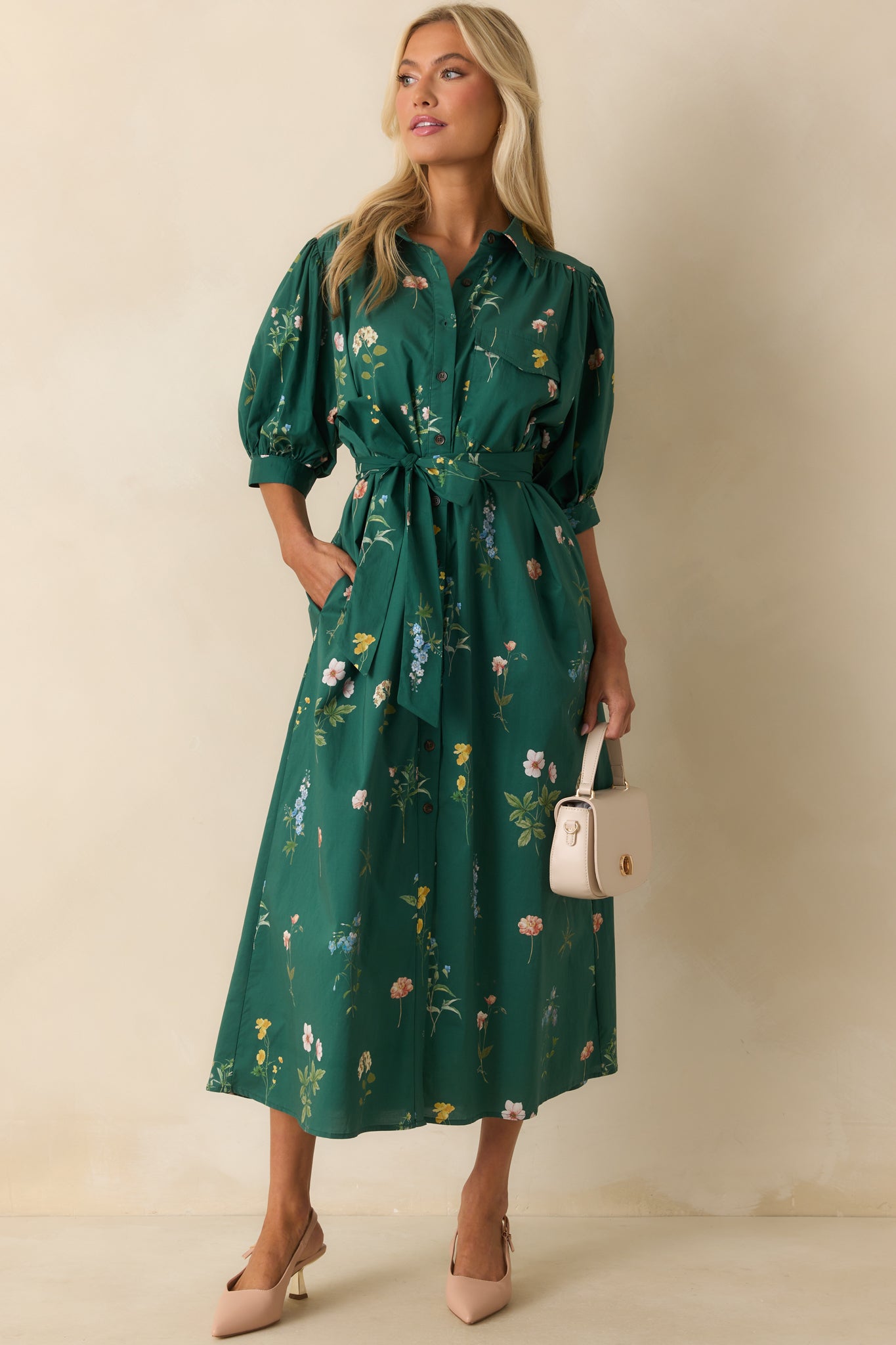 Dress featuring functional button front, chest patch pocket, and optional self-tie belt.