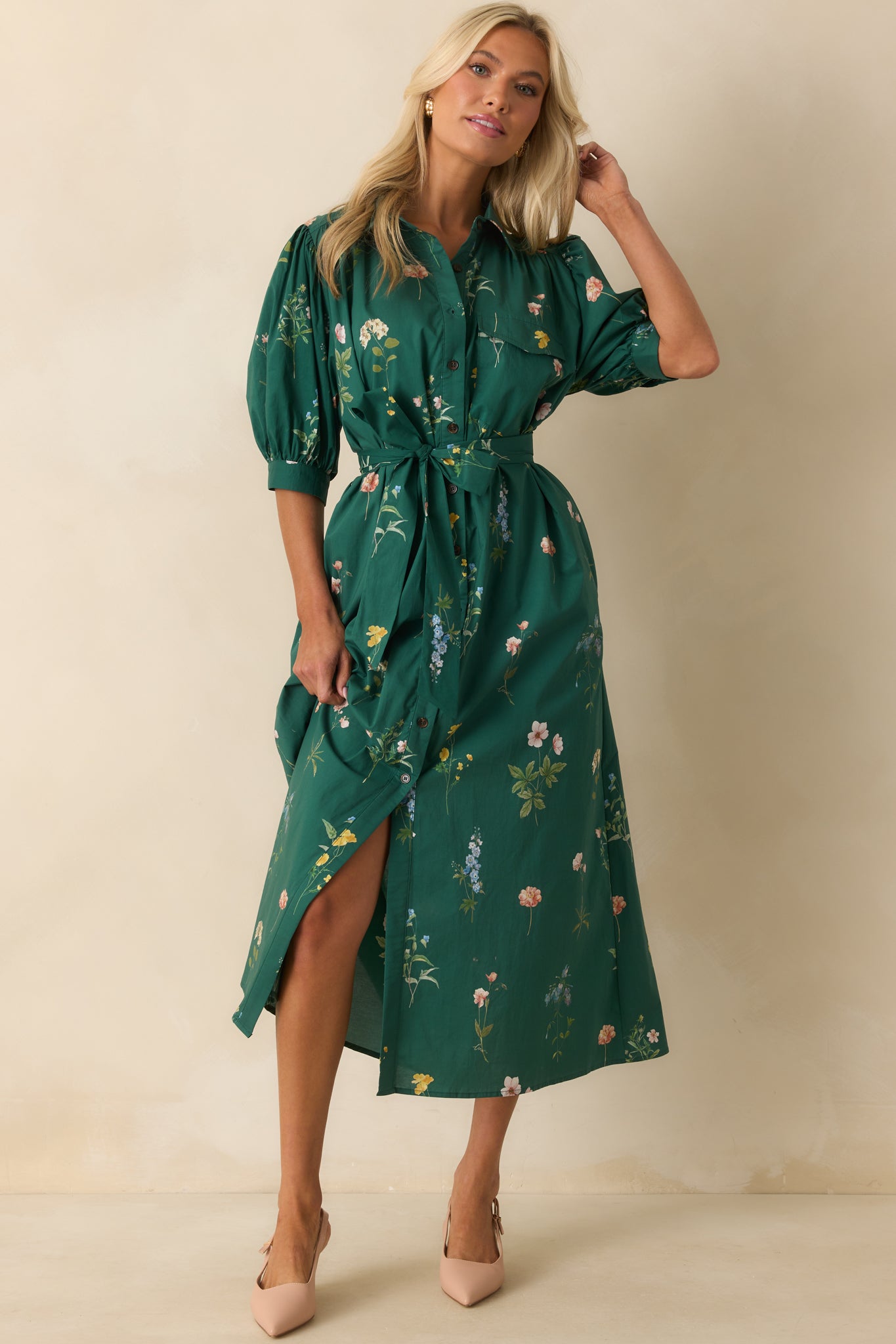 Maxi dress highlighting side pockets and relaxed, flowy silhouette.