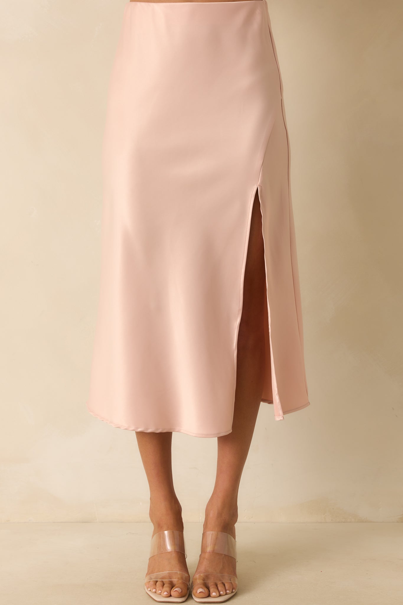 A cropped angle highlighting the satin material and leg slit detail.