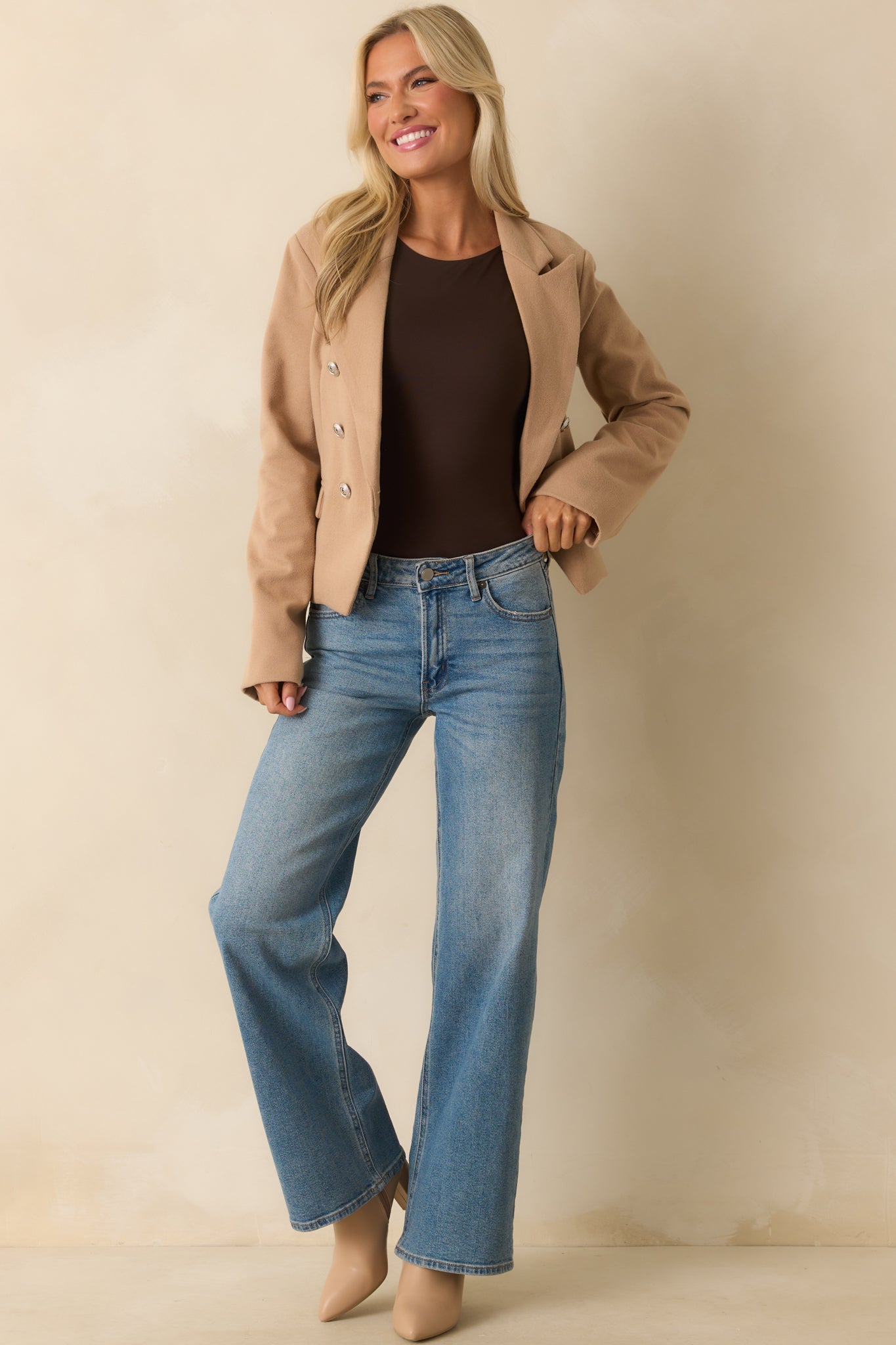 A full front-facing shot emphasizing the structured fit and slightly boxy silhouette.