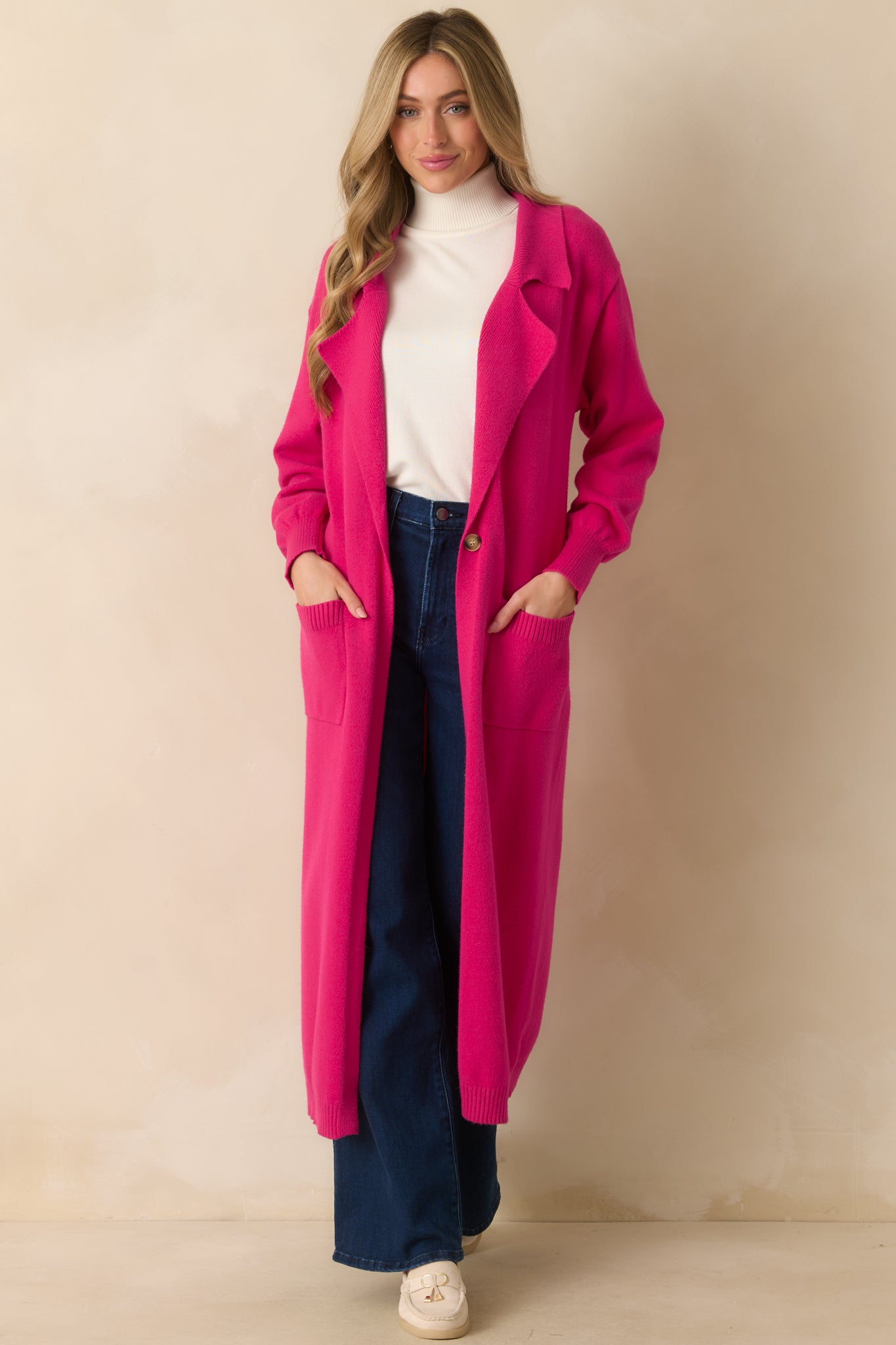 Full view of the cardigan emphasizing the lapel collared neckline, vibrant color, and casual yet polished silhouette.