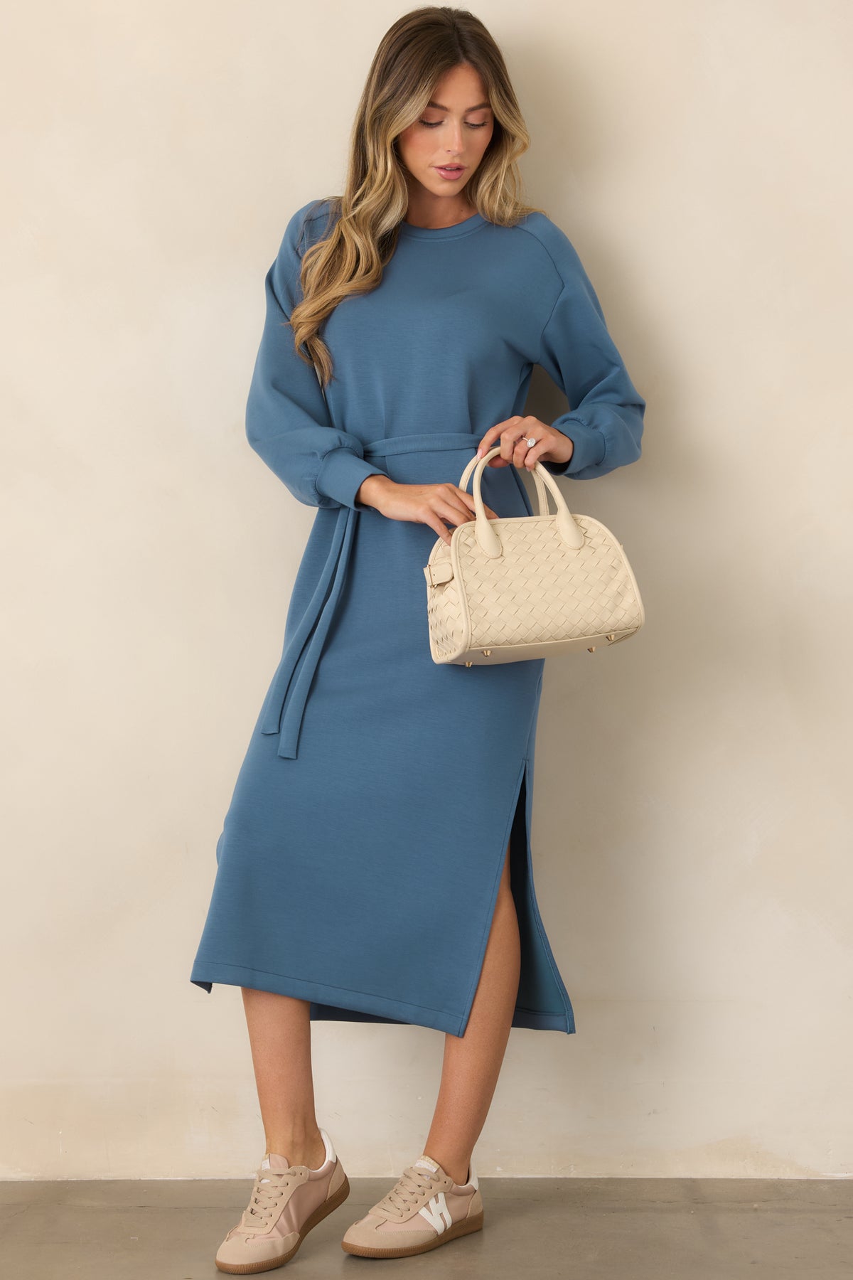 Blue midi dress featuring long sleeves, a crew neckline, and a removable waist tie.