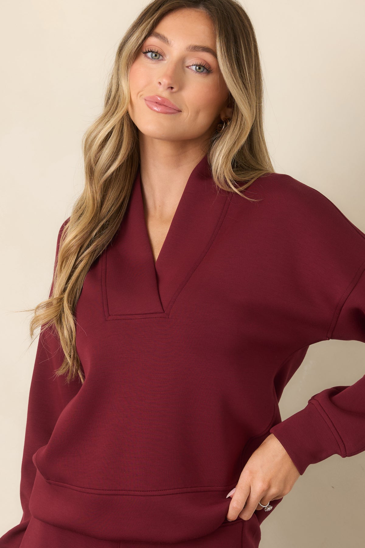 Vino red long sleeve sweatshirt with dropped shoulders and a wide banded hem