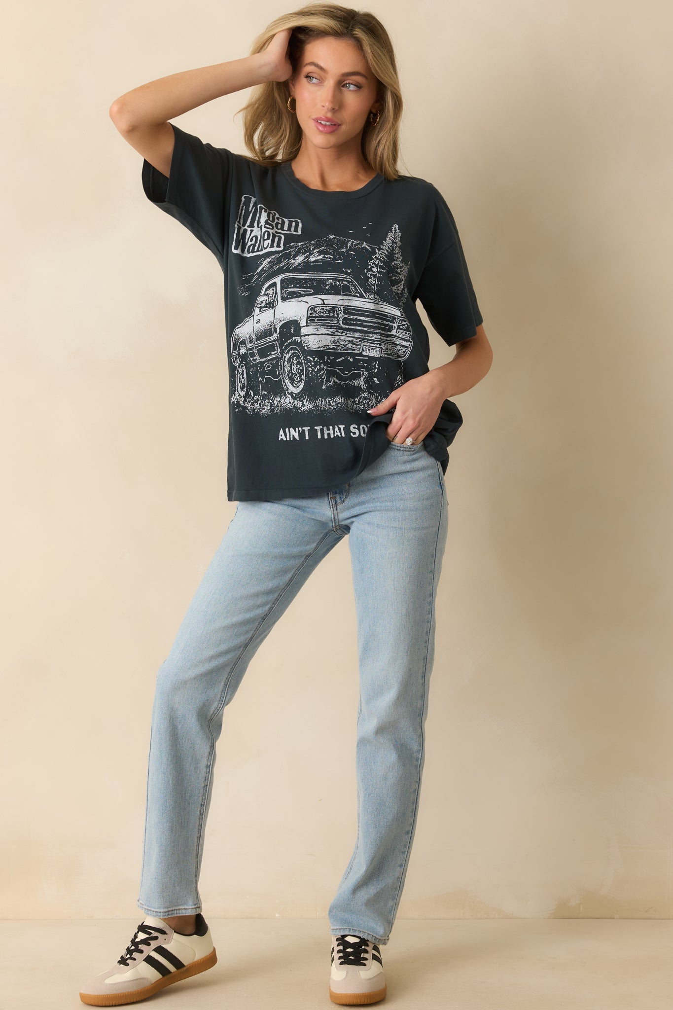 Black graphic t-shirt featuring washed finish and casual unisex silhouette