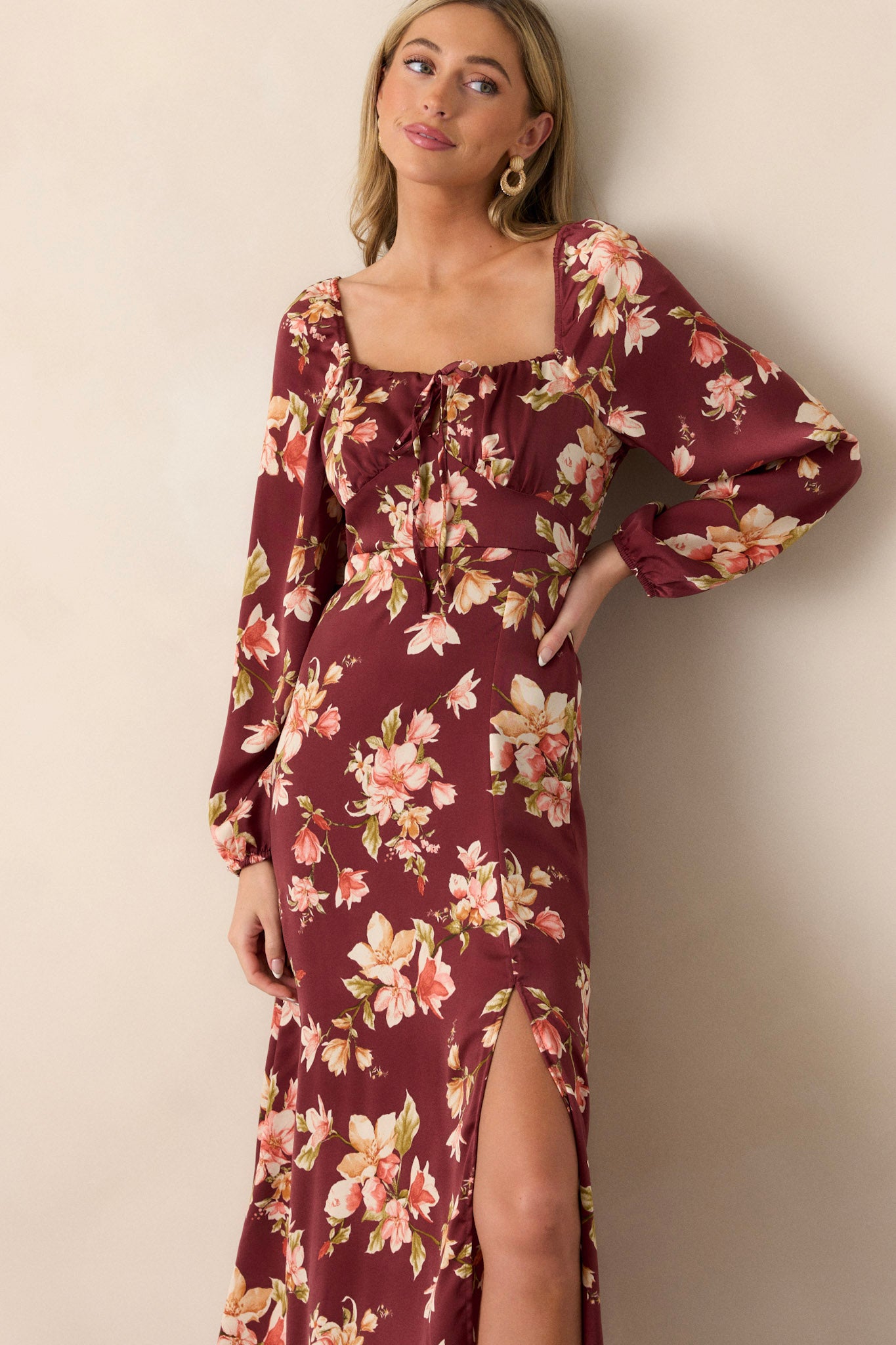 Full body image capturing the self-tie detail on the bust, emphasizing the stylish yet feminine touch of the dress.