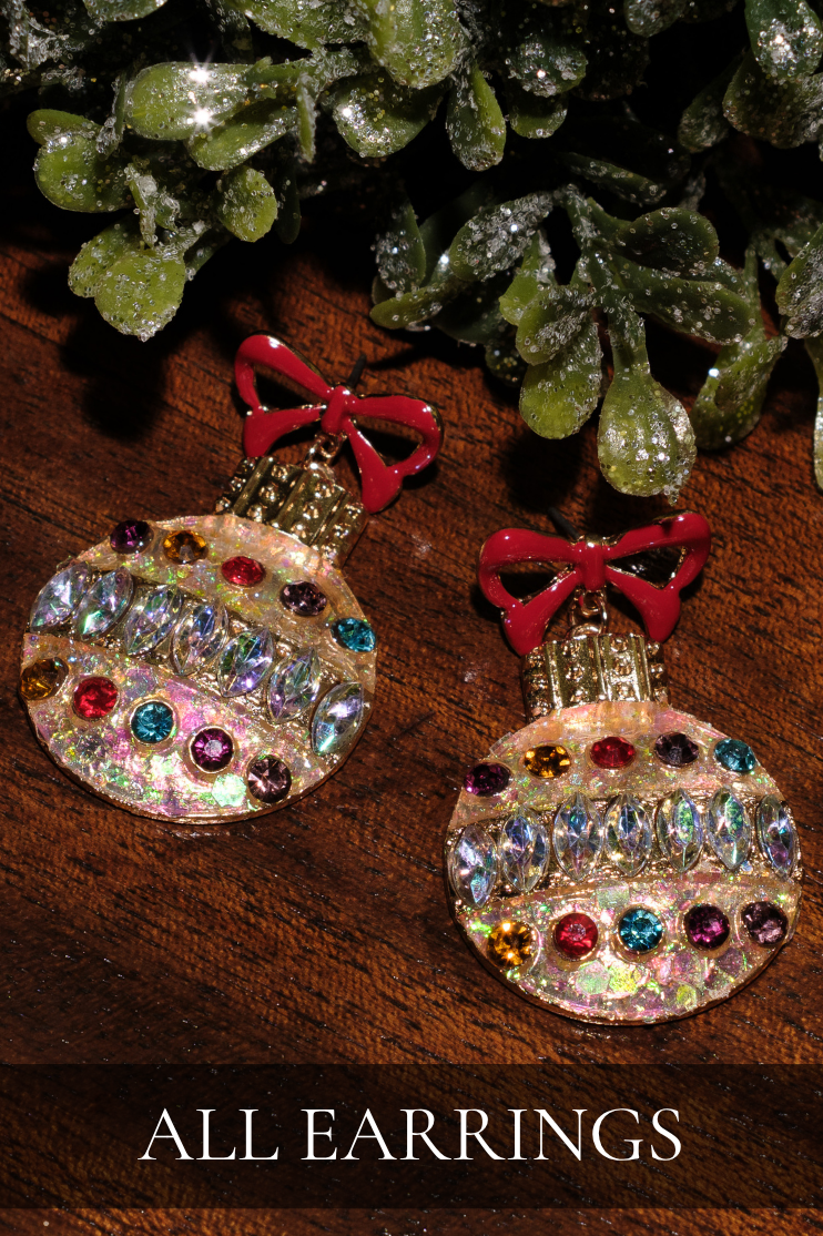 Flat lay of holiday earrings. Text reads: "All Earrings."