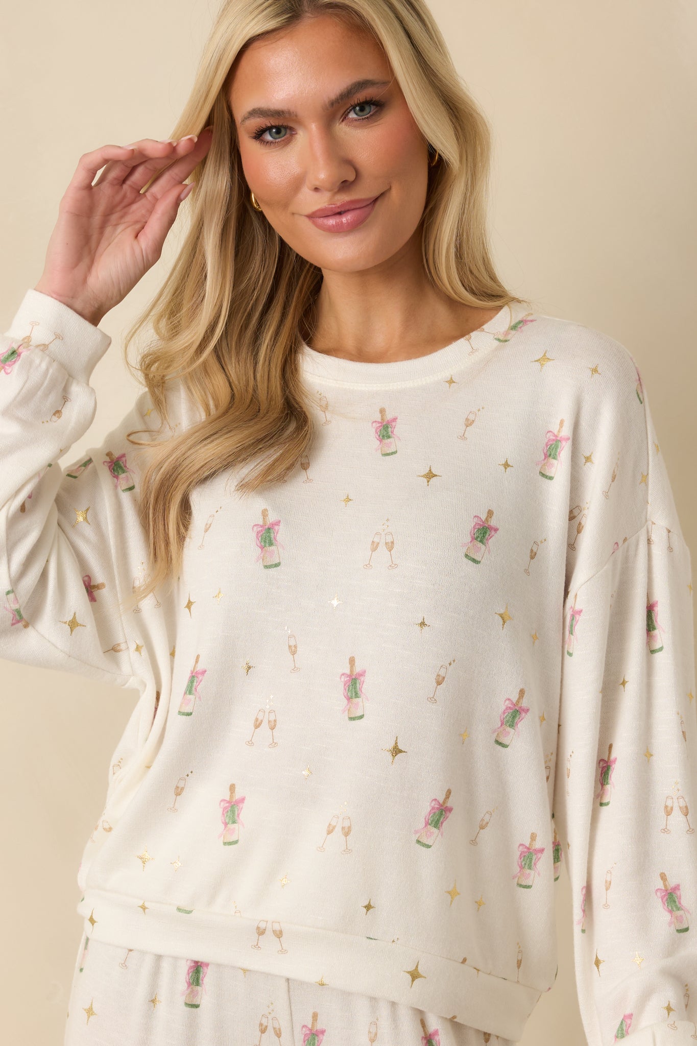 View focusing on the allover print and relaxed knit fit.