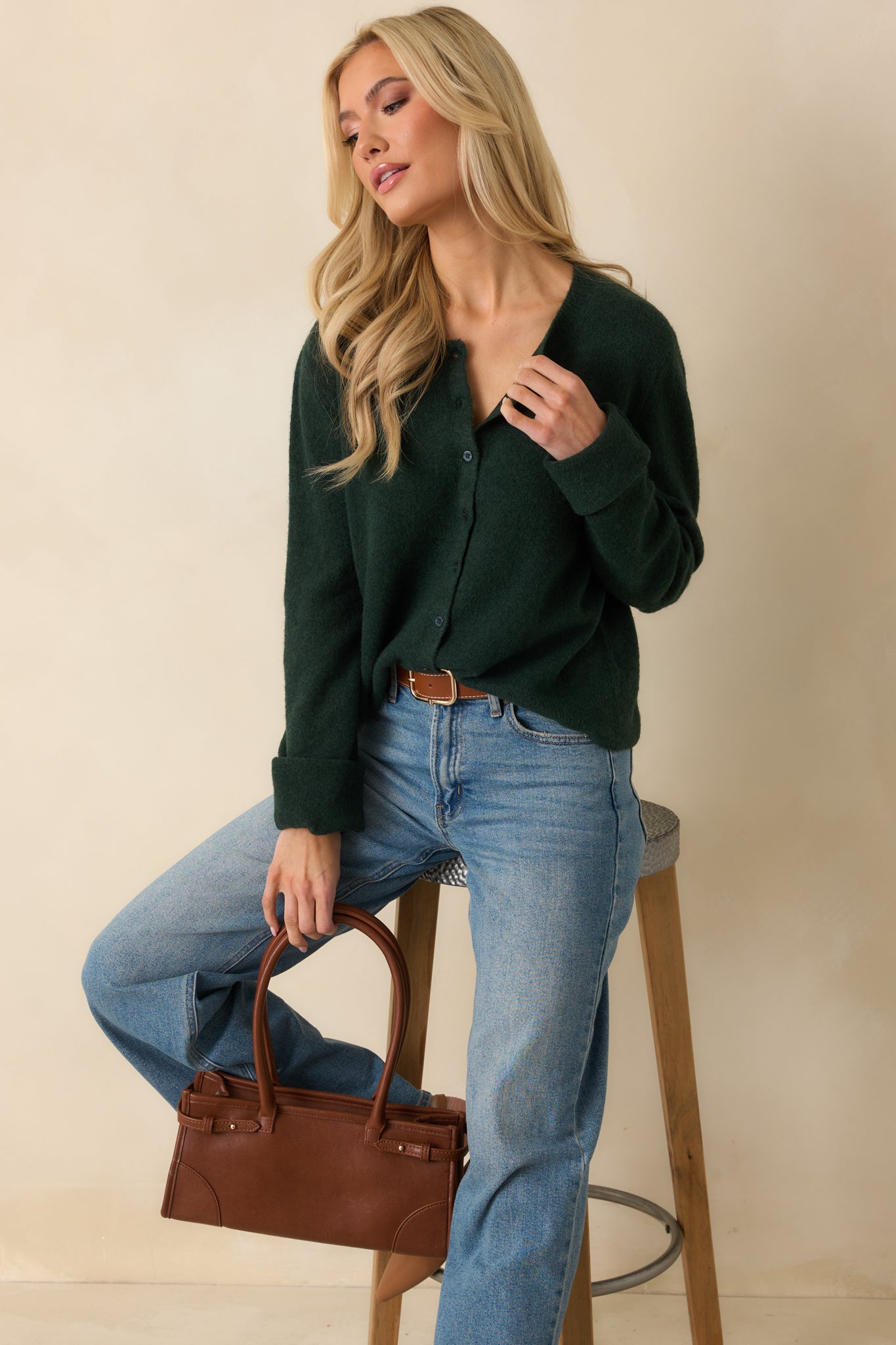 Angled front view showing the overall fit, texture, and relaxed shape of the cardigan.
