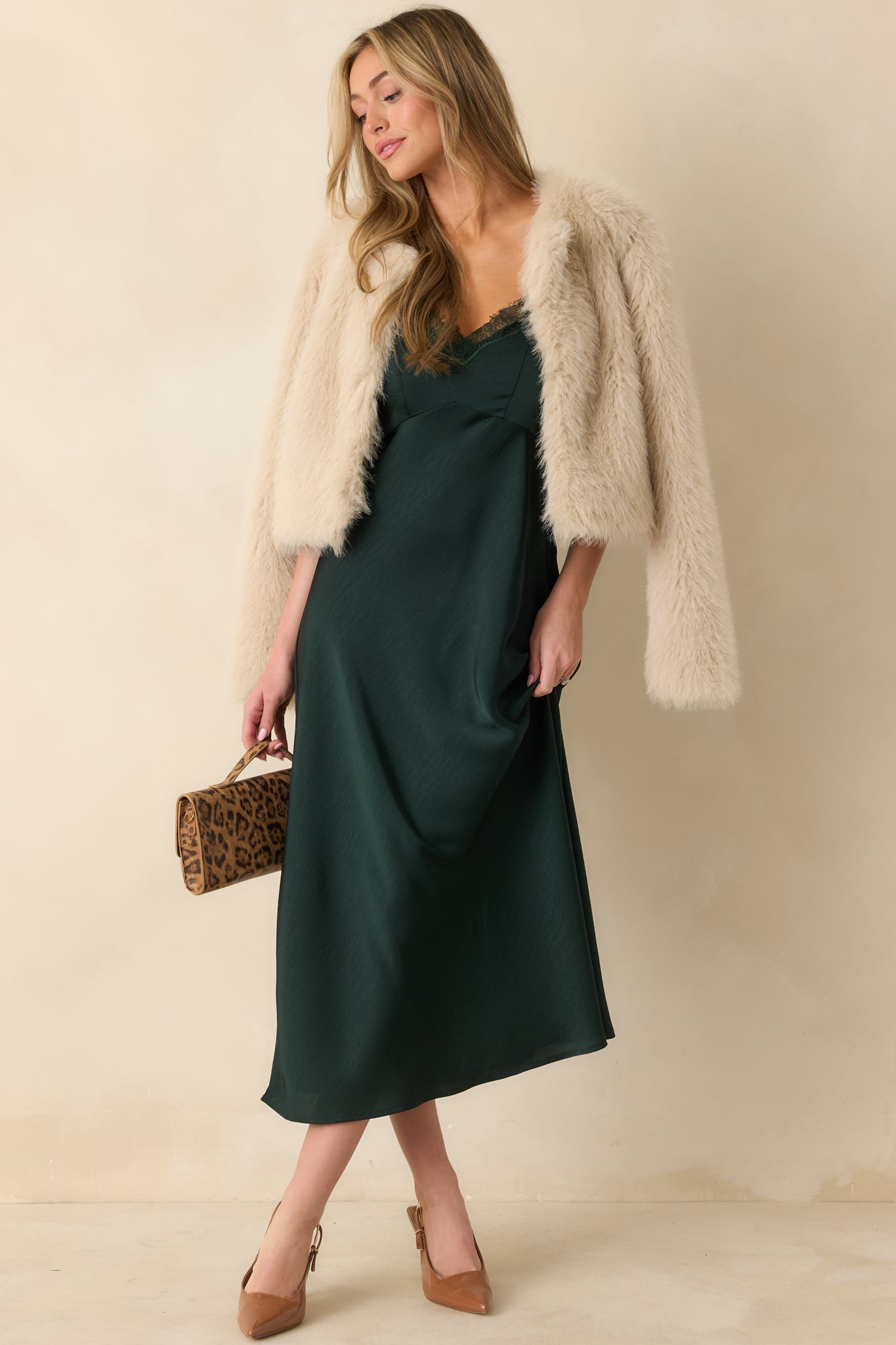 Slightly angled front view showing soft drape of woven fabric and bust seaming details.