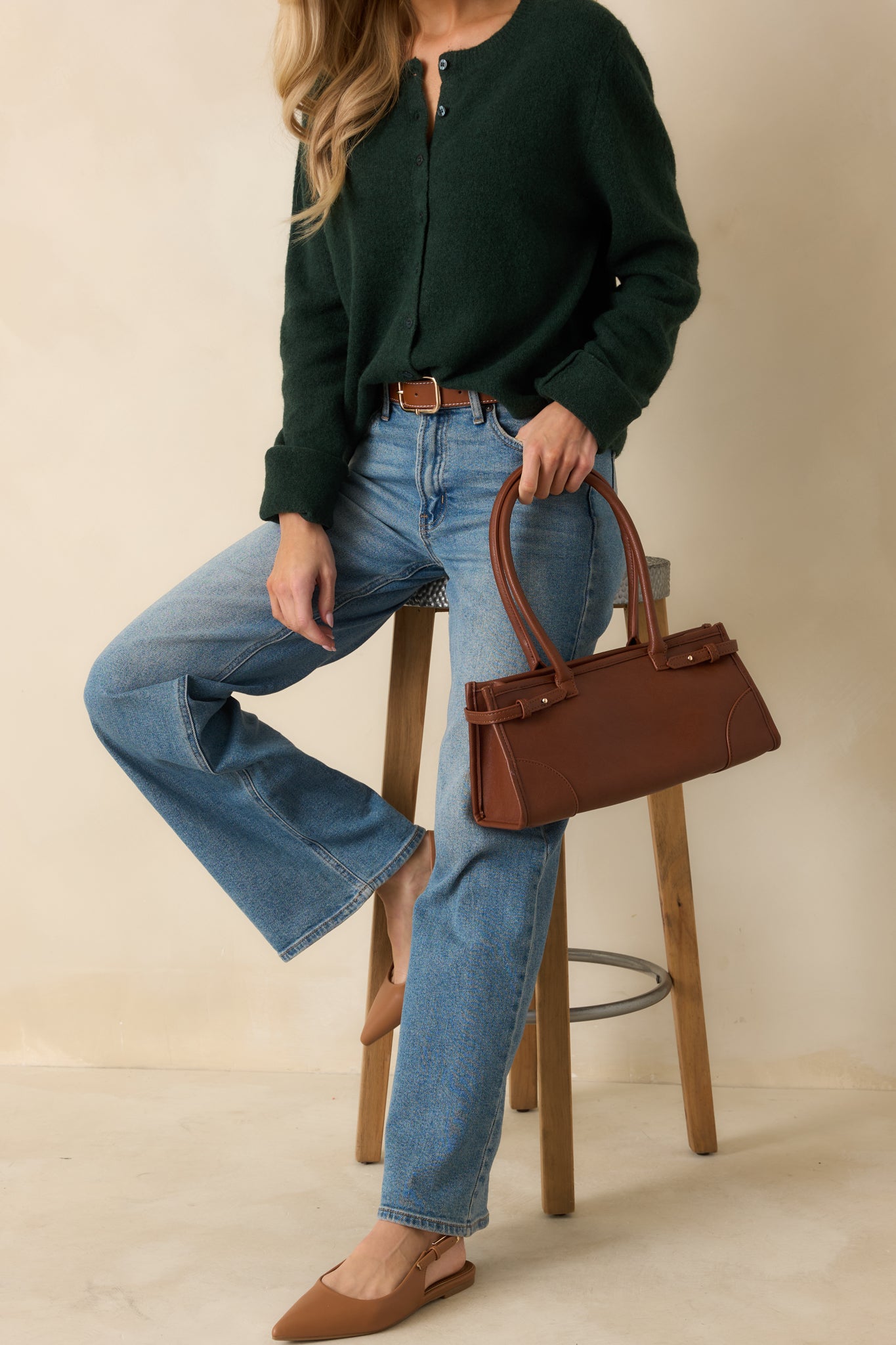 Slightly angled front view highlighting soft knit fabric and cozy silhouette.